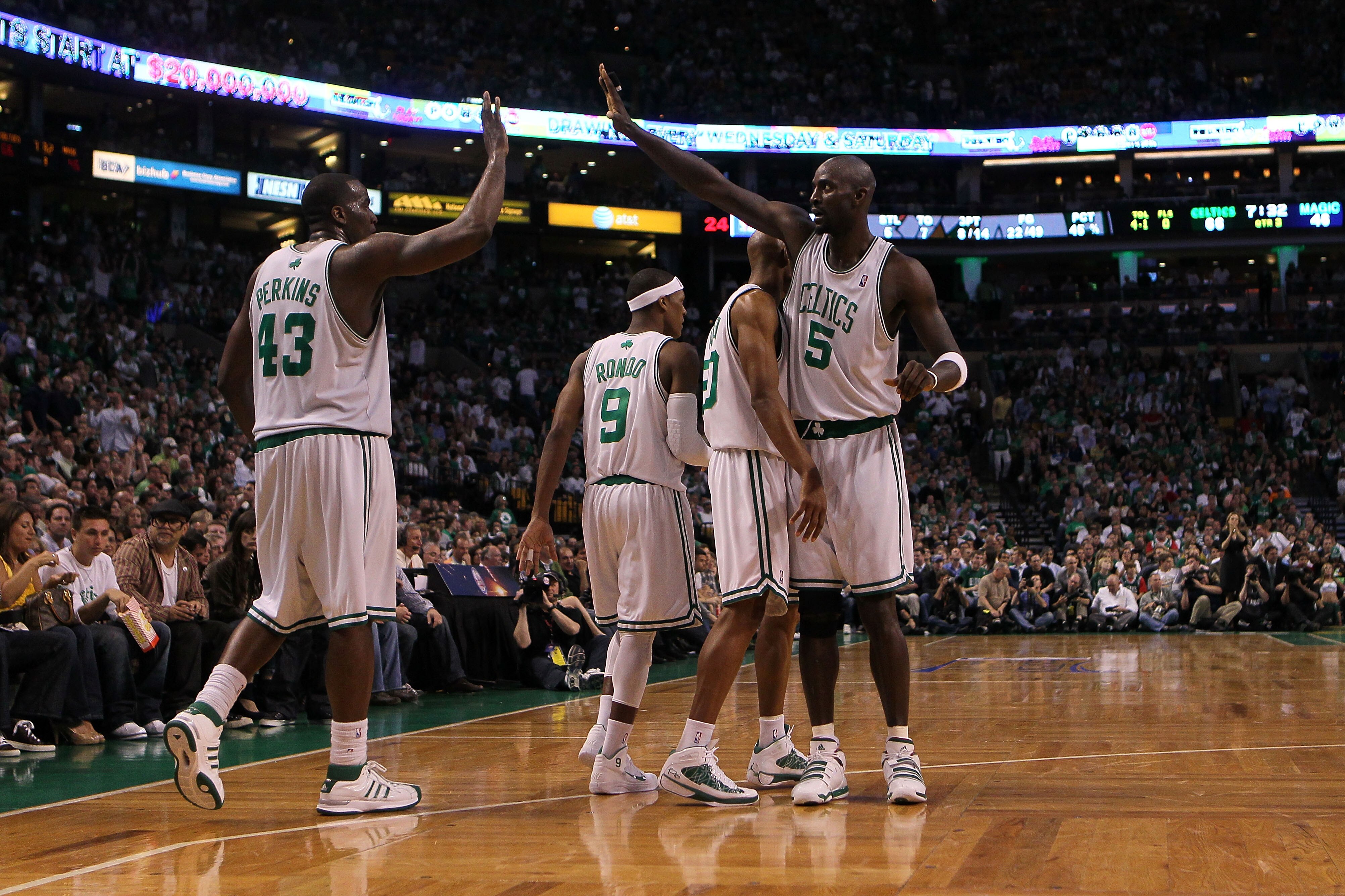 BOSTON - MAY 28:  (L-R) Kendrick Perkins #43, Rajon Rondo #9, Ray Allen #20 and Kevin Garnett #5 of the Boston Celtics react against the Orlando Magic in Game Six of the Eastern Conference Finals during the 2010 NBA Playoffs at TD Garden on May 28, 2010 i