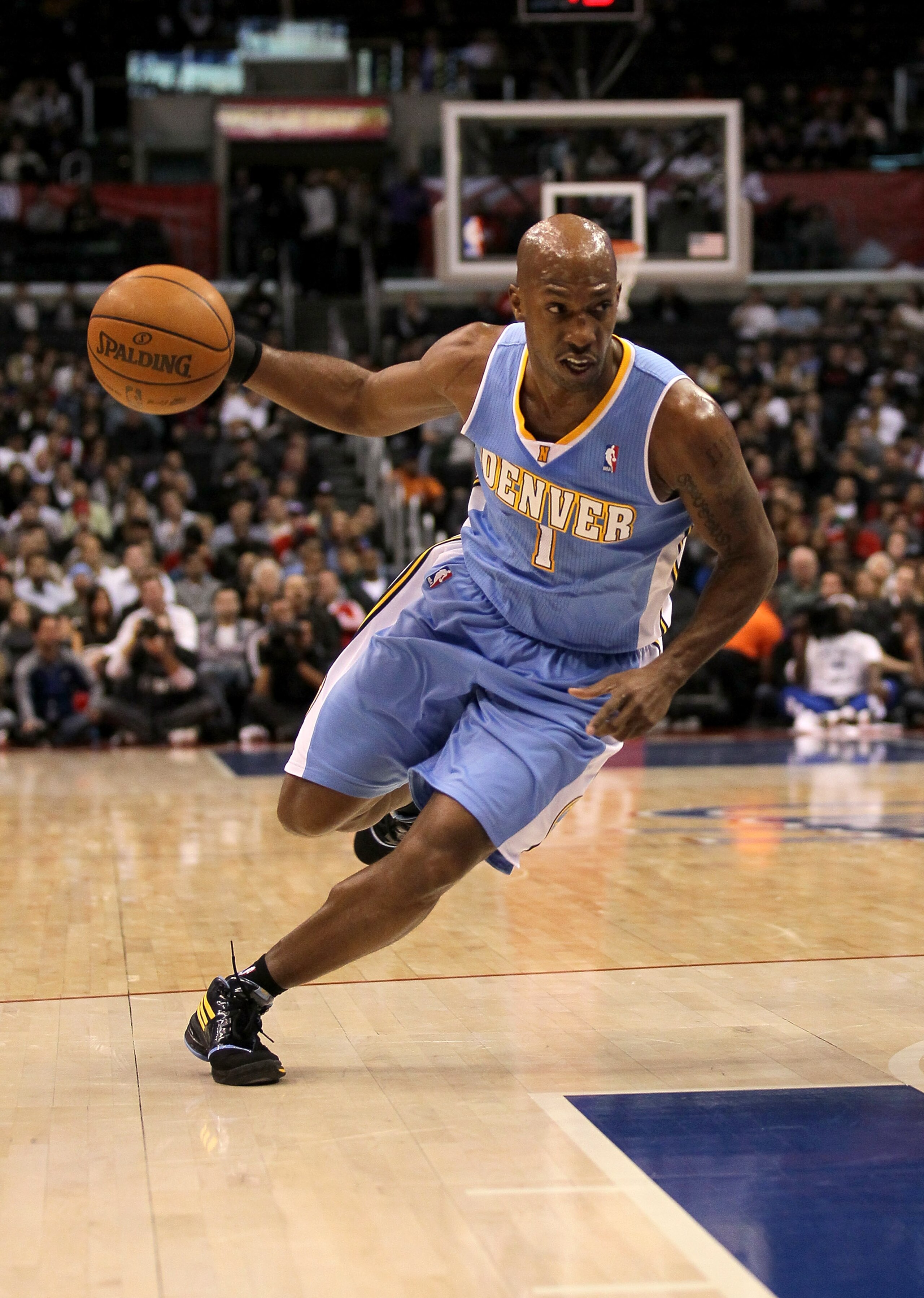 LOS ANGELES, CA - JANUARY 05: Chauncey Billups #1 of the Denver Nuggets drives against the Los Angeles Clippers at Staples Center on January 5, 2011 in Los Angeles, California. The Clippers won 106-93. NOTE TO USER: User expressly acknowledges and agre LOS ANGELES, CA - JANUARY 05: Chauncey Billups #1 of the Denver Nuggets drives against the Los Angeles Clippers at Staples Center on January 5, 2011 in Los Angeles, California. The Clippers won 106-93. NOTE TO USER: User expressly acknowledges and agre