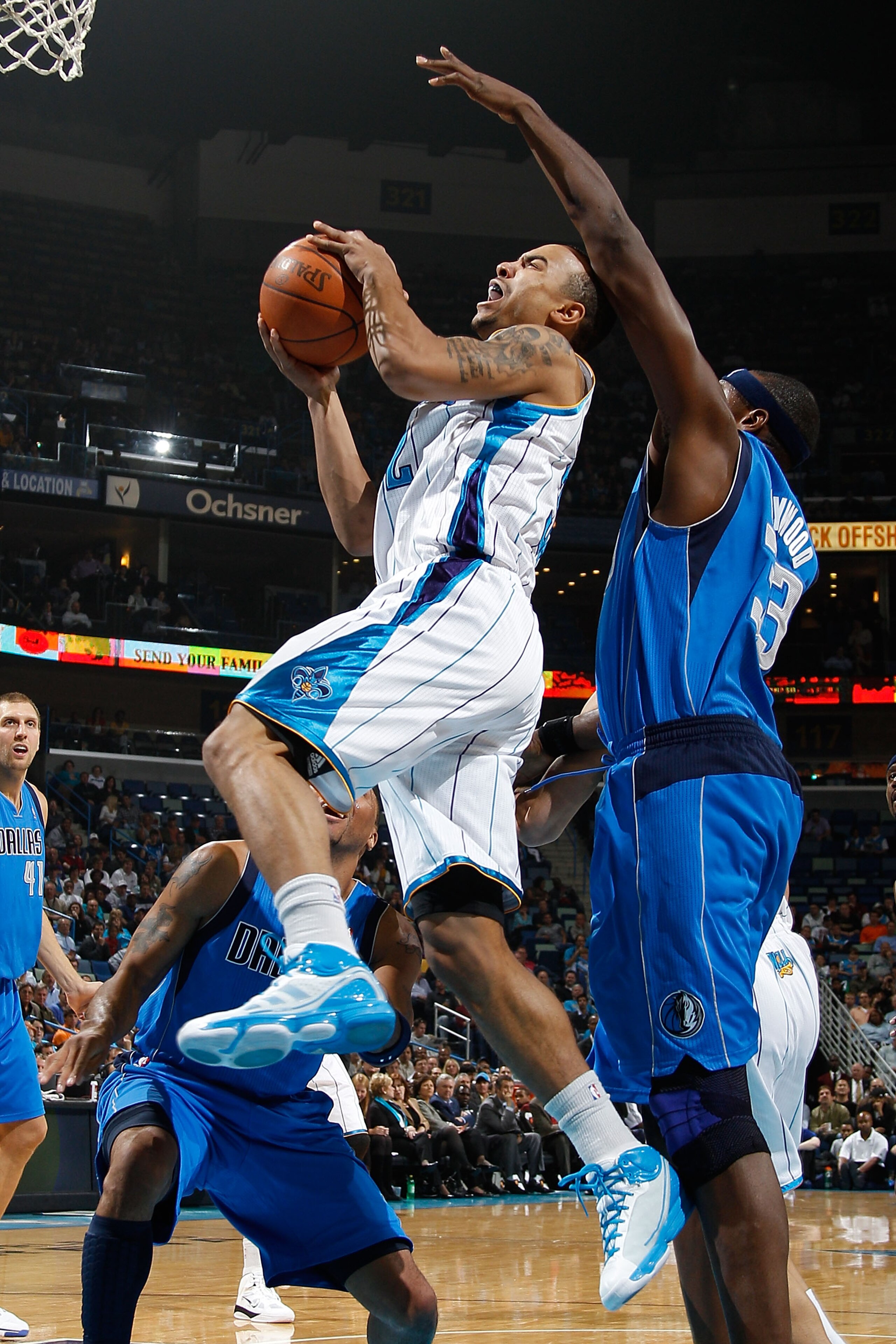 NEW ORLEANS - NOVEMBER 17: Jerryd Bayless #32 of the New Orleans Hornets shoots the ball over Brendan Haywood #33 of the Dallas Mavericks at the New Orleans Arena on November 17, 2010 in New Orleans, Louisiana. The Hornets defeated the Mavericks 99-97. NEW ORLEANS - NOVEMBER 17: Jerryd Bayless #32 of the New Orleans Hornets shoots the ball over Brendan Haywood #33 of the Dallas Mavericks at the New Orleans Arena on November 17, 2010 in New Orleans, Louisiana. The Hornets defeated the Mavericks 99-97.