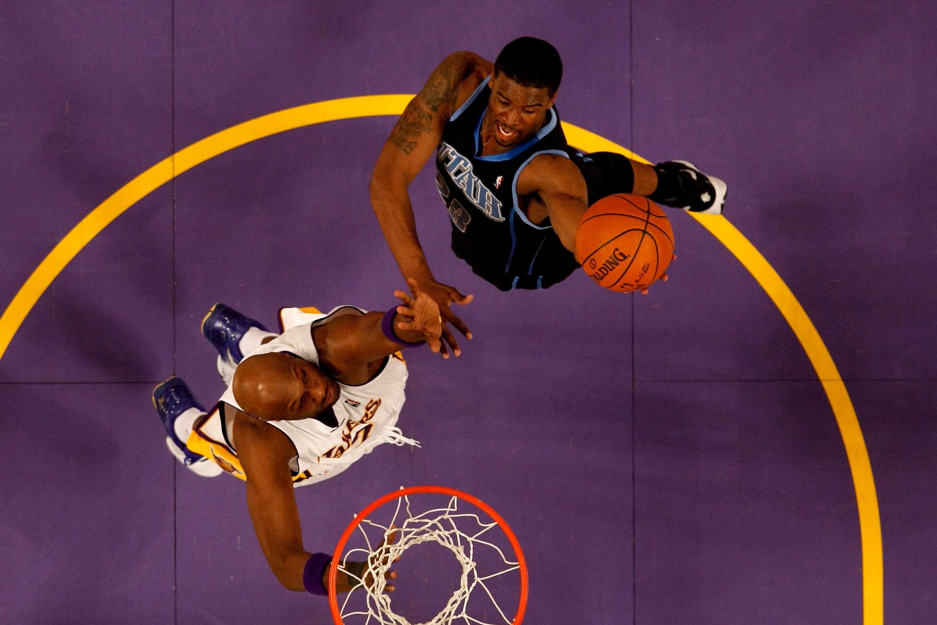 LOS ANGELES, CA - MAY 02:  Wesley Matthews #23 of the Utah Jazz shoots over Lamar Odom #7 of the Los Angeles Lakers during Game One of the Western Conference Semifinals of the 2010 NBA Playoffs on May 2, 2010 at Staples Center in Los Angeles, California.