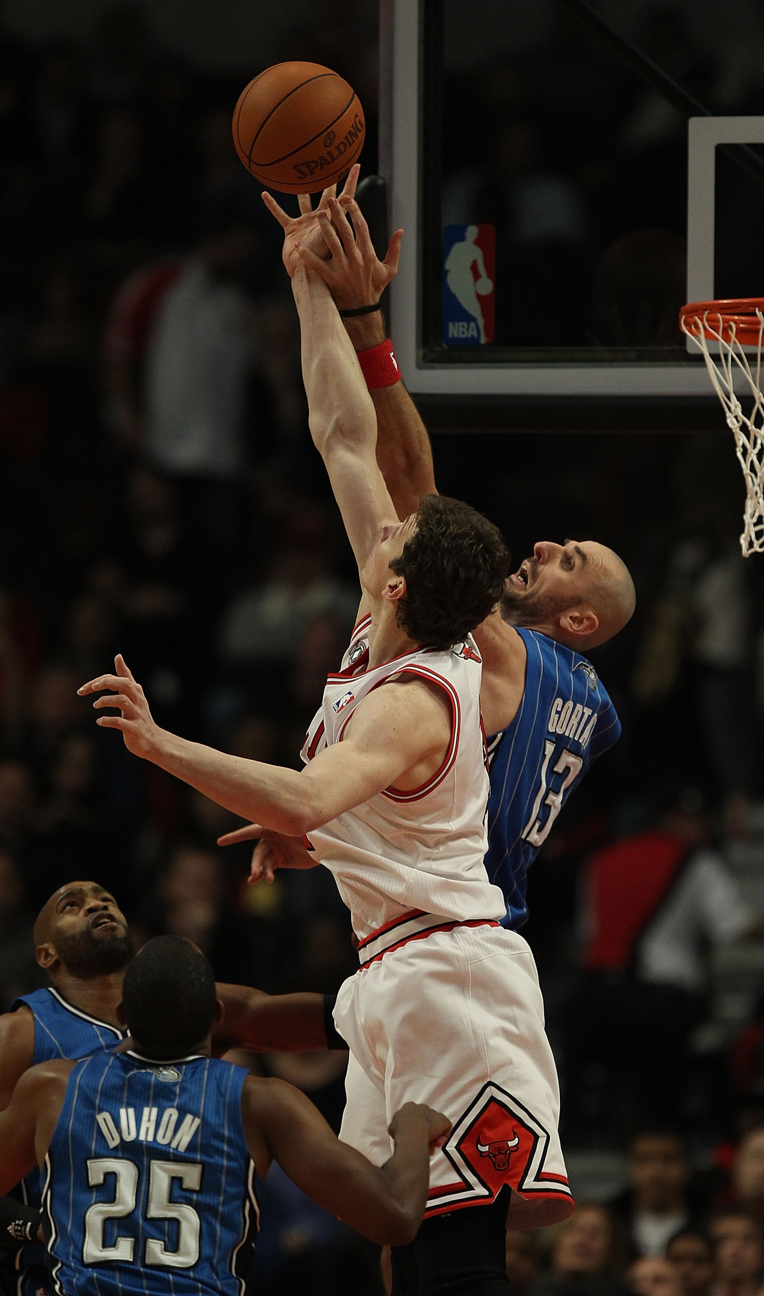 CHICAGO, IL - DECEMBER 01: Omer Asik #3 of the Chicago Bulls battles for a rebound with Marcin Gortat #13 of the Orlando Magic at the United Center on December 1, 2010 in Chicago, Illinois.The Magic defeated the Bulls 107-78. NOTE TO USER: User expressly