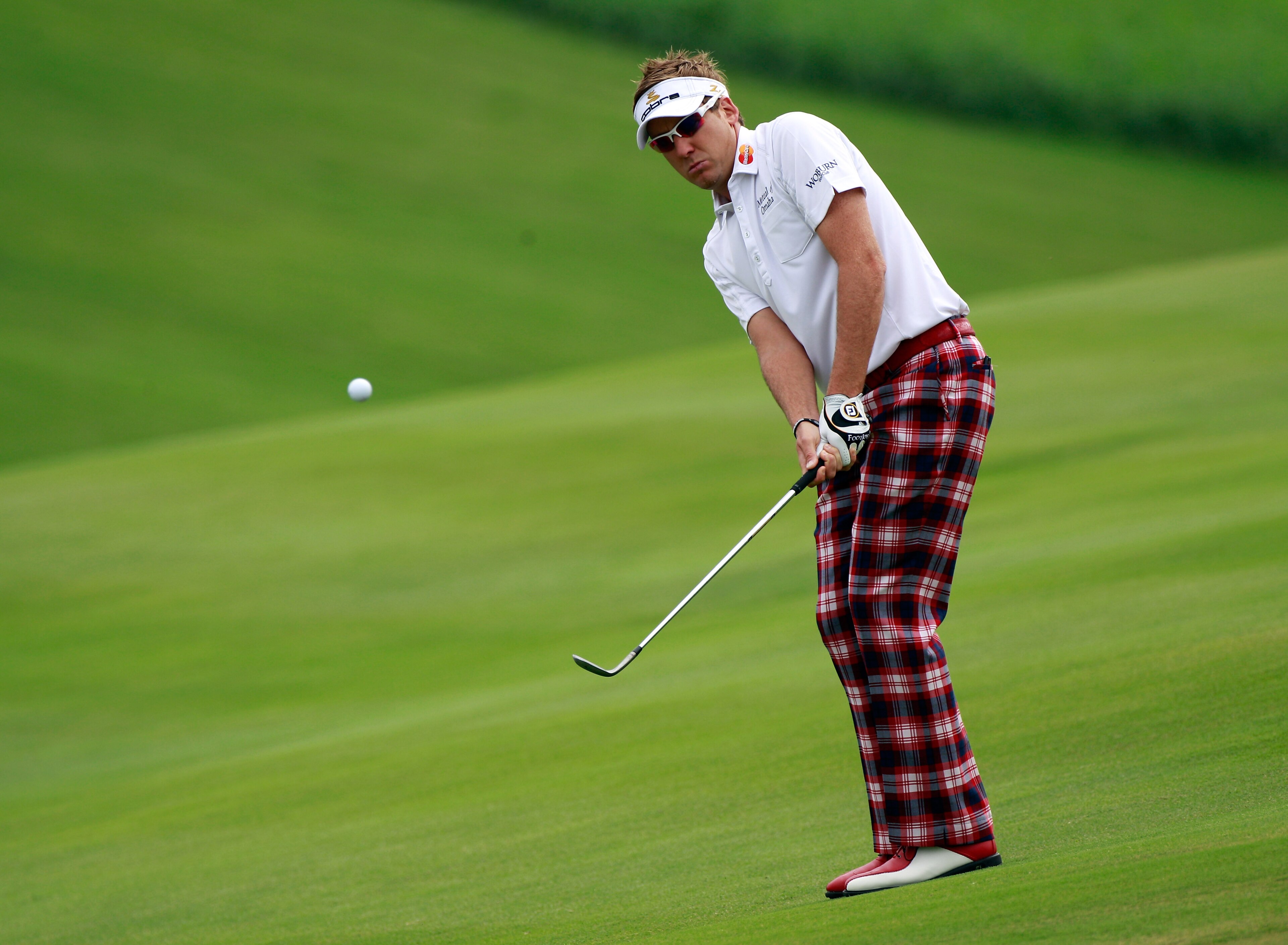 KAPALUA, HI - JANUARY 07:  Ian Poulter of England plays a shot during the second round of the Hyundai Tournament of Champions at the Plantation course on January 7, 2011 in Kapalua, Hawaii.  (Photo by Sam Greenwood/Getty Images)