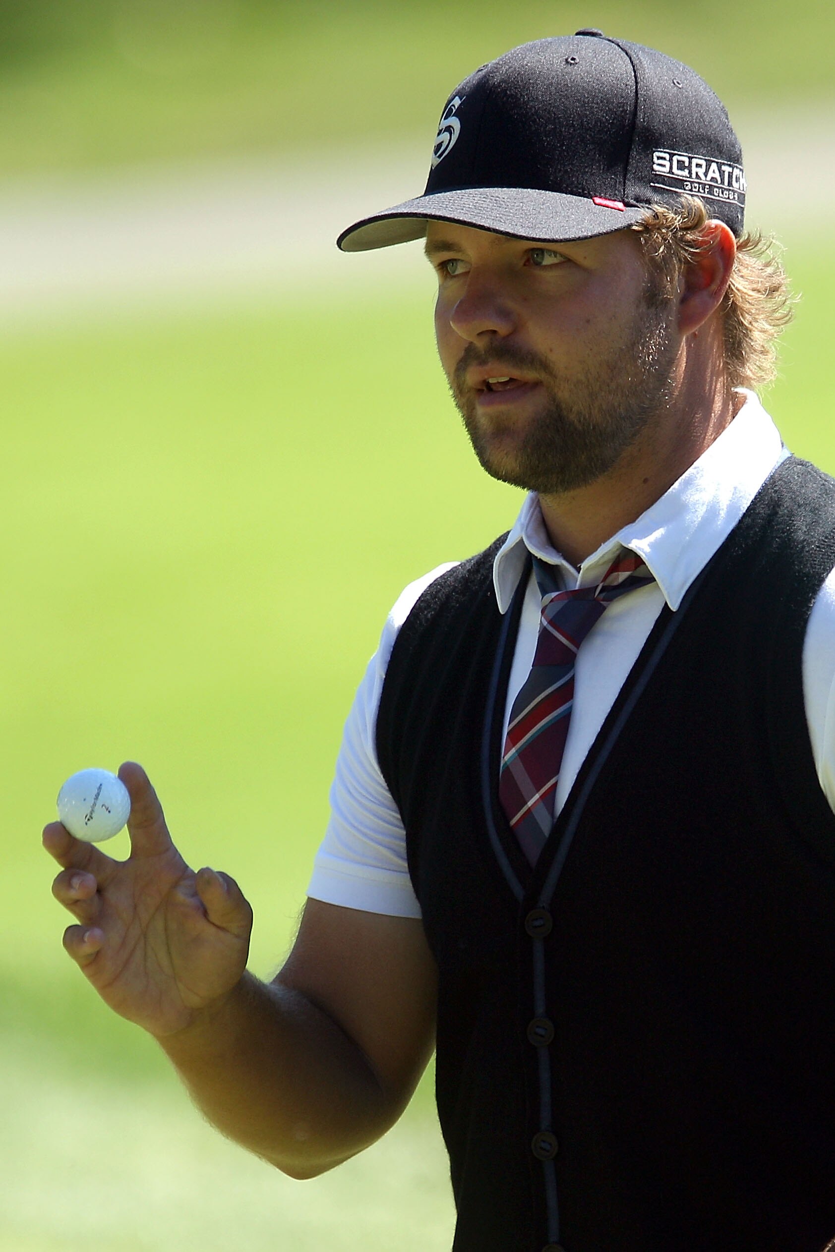 LEMONT, IL - SEPTEMBER 12:  Ryan Moore holds up the ball on the sixth hole during the final round of the BMW Championship at Cog Hill Golf & Country Club on September 12, 2010 in Lemont, Illinois.  (Photo by Scott Halleran/Getty Images)
