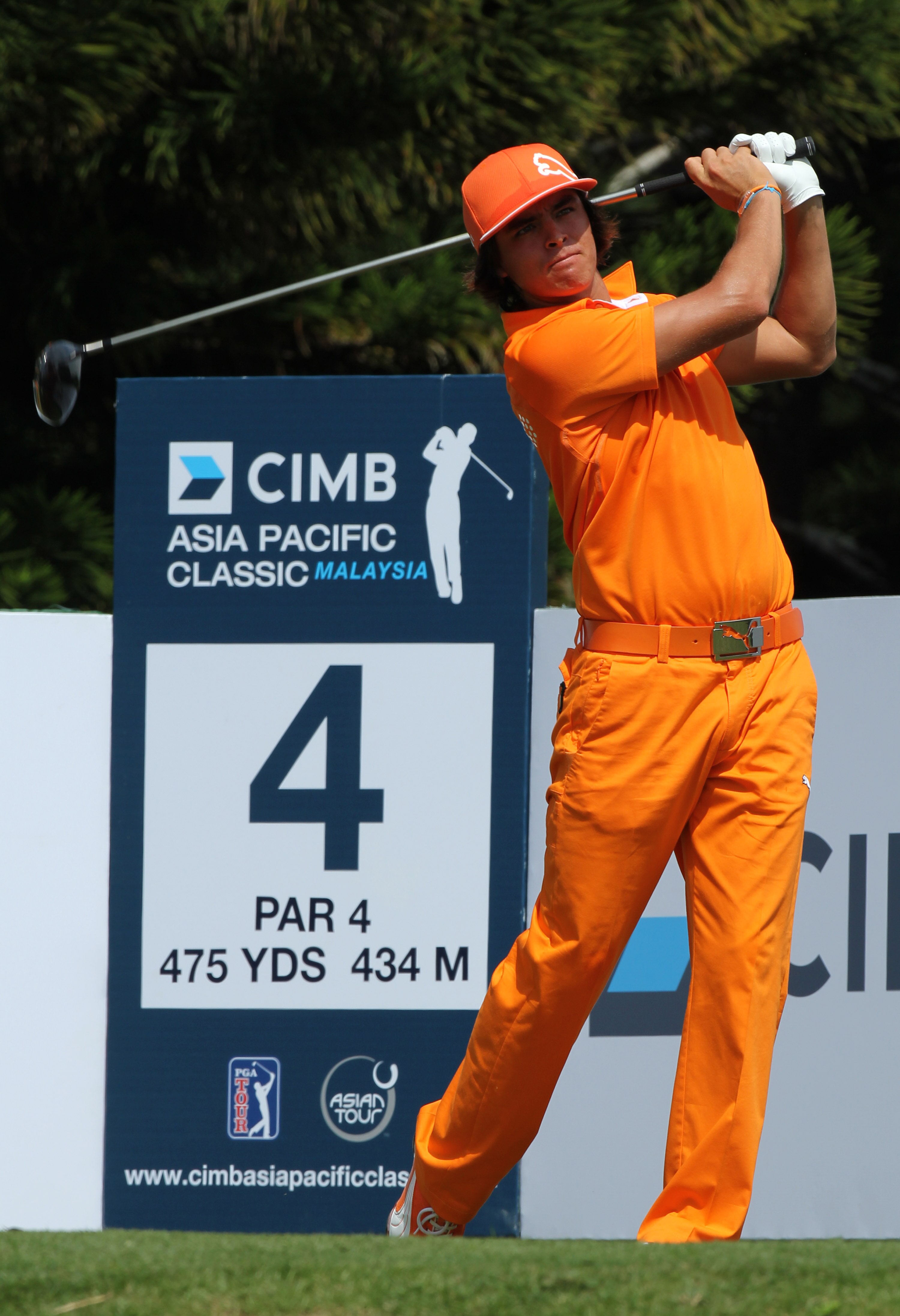 KUALA LUMPUR, MALAYSIA - OCTOBER 31: Rickie Fowler of USA follows through his tee shot on the 4th holeduring day four of the CIMB Asia Pacific Classic at The MINES Resort & Golf Club on October 31, 2010 in Kuala Lumpur, Malaysia. (Photo by Stanley Chou/Ge