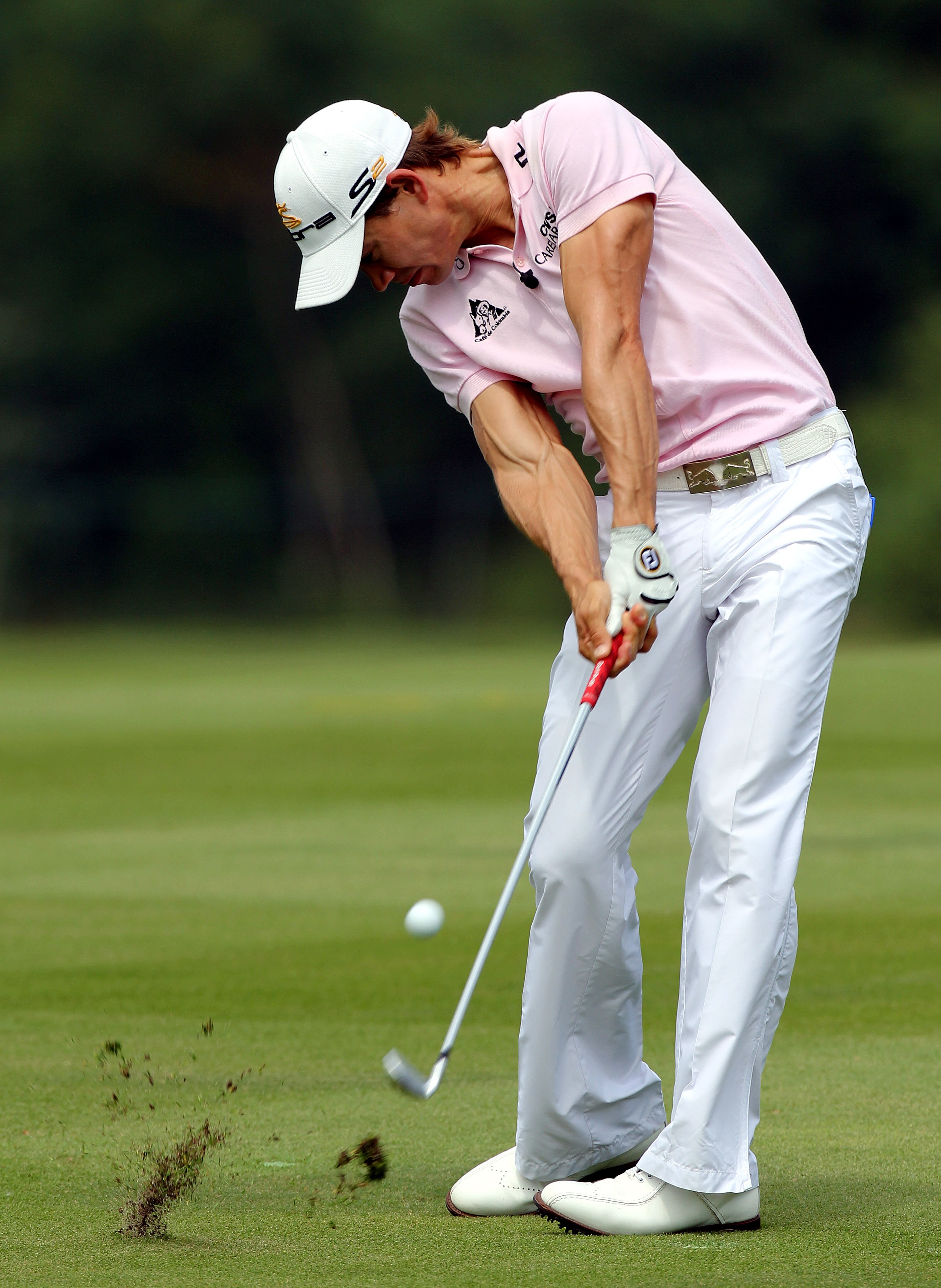 CHONBURI, THAILAND - NOVEMBER 08: Camilo Villegas of Columbia plays his 2nd shot on the 4th hole during the World Golf Salutes King Bhumibol Skins tournament at Amata Spring Country Club on November 8, 2010 in Bangkok, Thailand. (Photo by Stanley Chou/Get