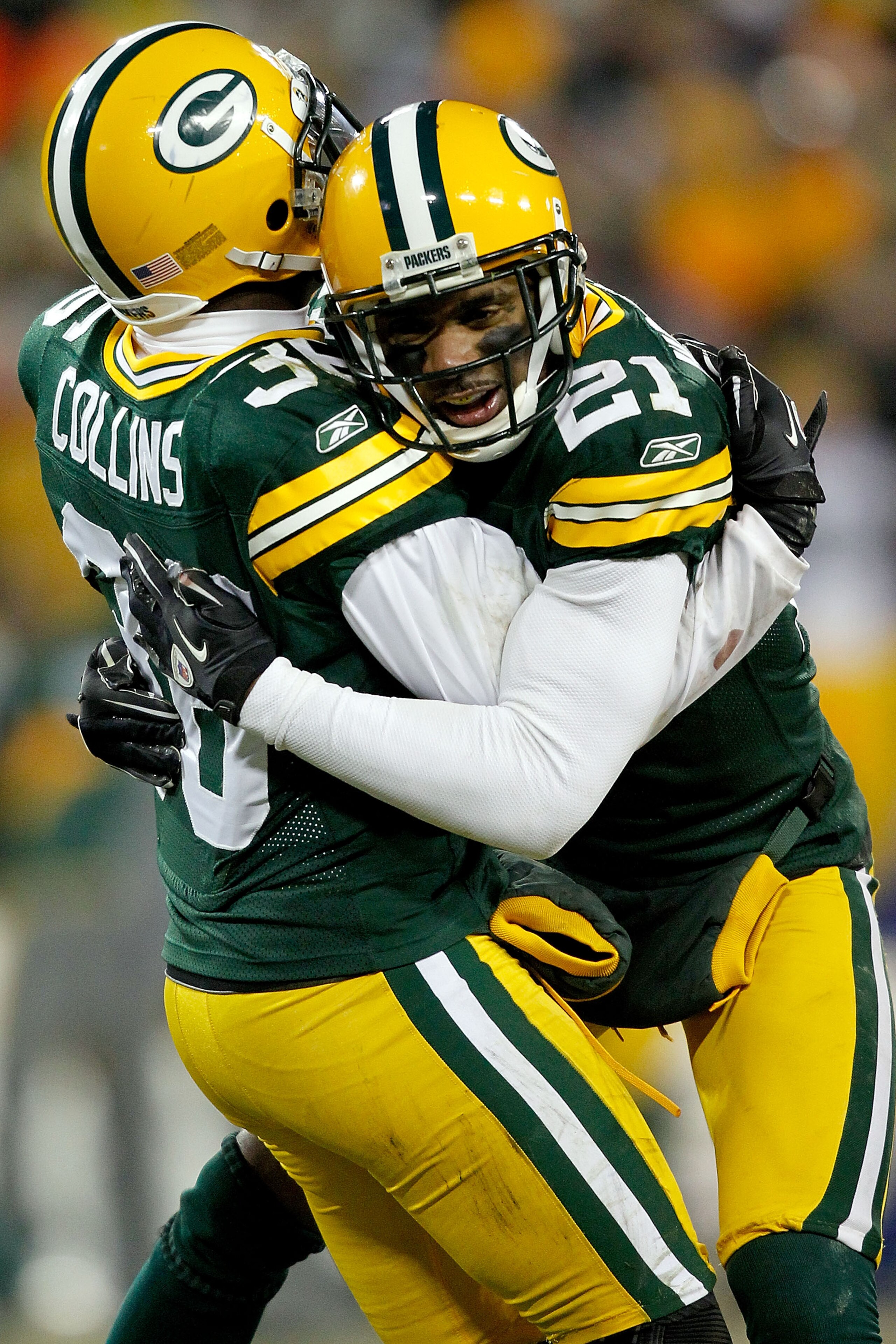 GREEN BAY, WI - JANUARY 02: Nick Collins #36 of the Green Bay Packers is congratulated by Charles Woodson #21 after making an interception against the Chicago Bears to end their final drive in the fourth quarter at Lambeau Field on January 2, 2011 in Gre GREEN BAY, WI - JANUARY 02: Nick Collins #36 of the Green Bay Packers is congratulated by Charles Woodson #21 after making an interception against the Chicago Bears to end their final drive in the fourth quarter at Lambeau Field on January 2, 2011 in Gre