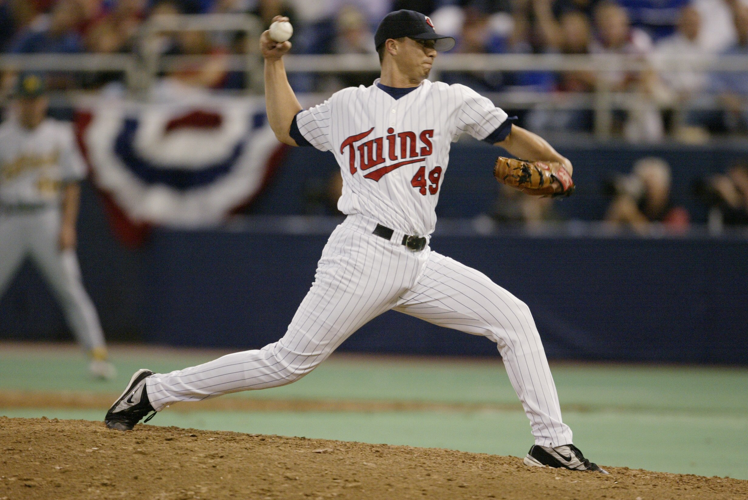 MINNEAPOLIS - OCTOBER 5:  Pitcher Kyle Lohse #49 of the Minnesota Twins delivers the ball during game four of the American League Division Series against the Oakland A's at the Hubert H. Humphrey Dome on October 5, 2002 in Minneapolis, Minnesota.  The Twi
