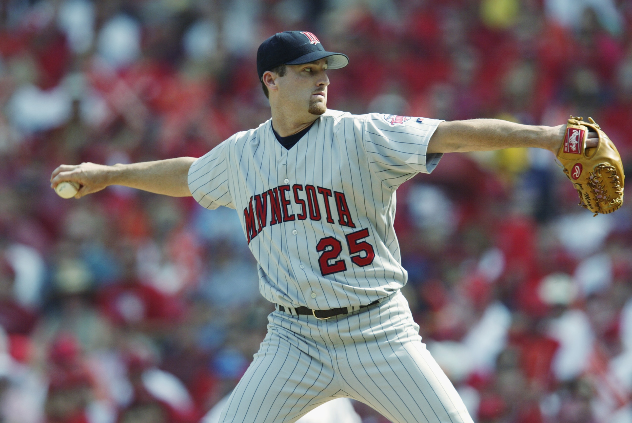 ANAHEIM, CA - OCTOBER 13:  Joe Mays #25 of the Minnesota Twins throws against the Anaheim Angels in Game five of the American League Championship Series on October 13, 2002 at Edison International Field in Anaheim, California.  The Angels defeated the Twi
