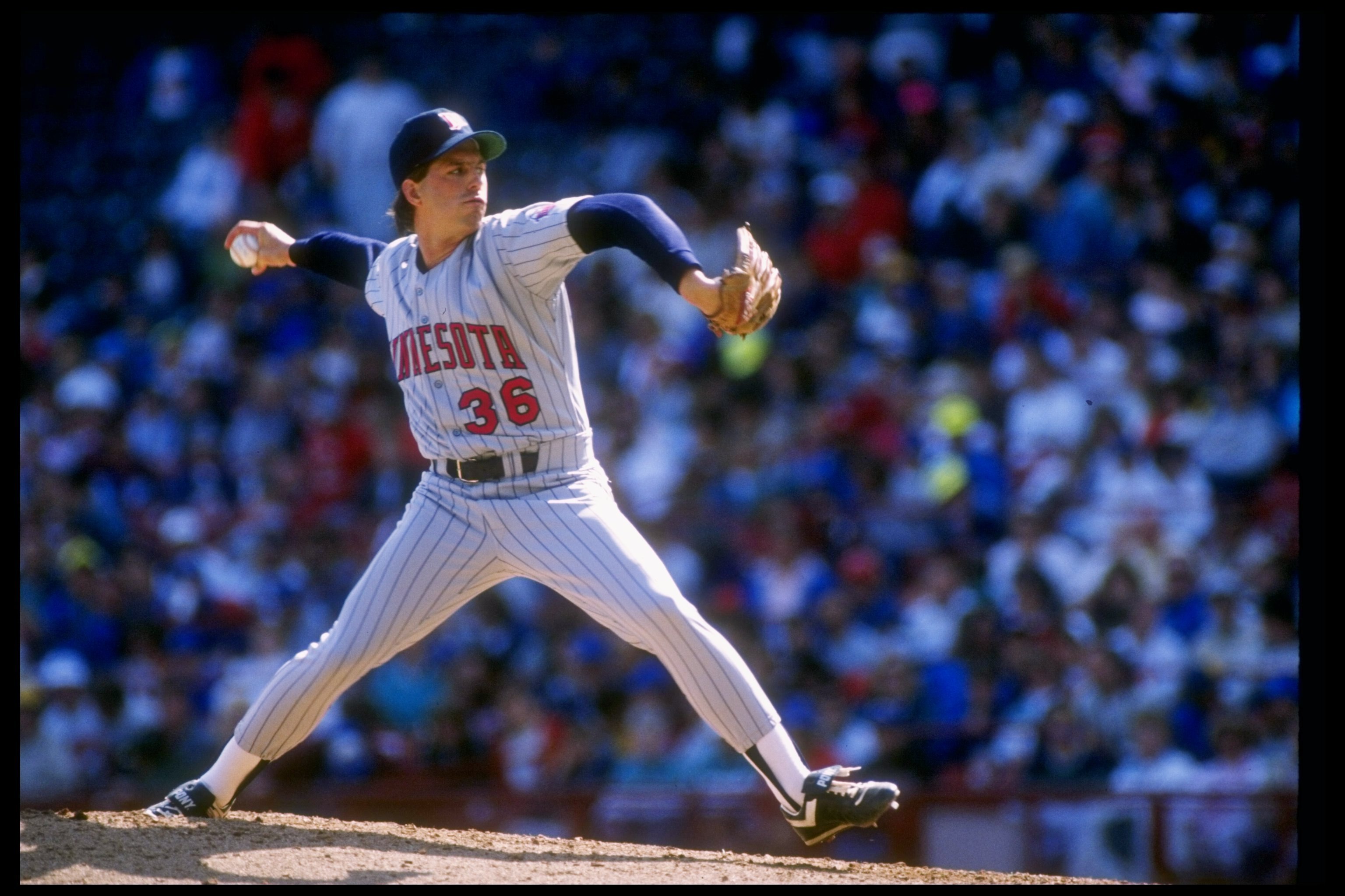 Pitcher Kevin Tapani of the Minnesota Twins throws the ball during a game.
