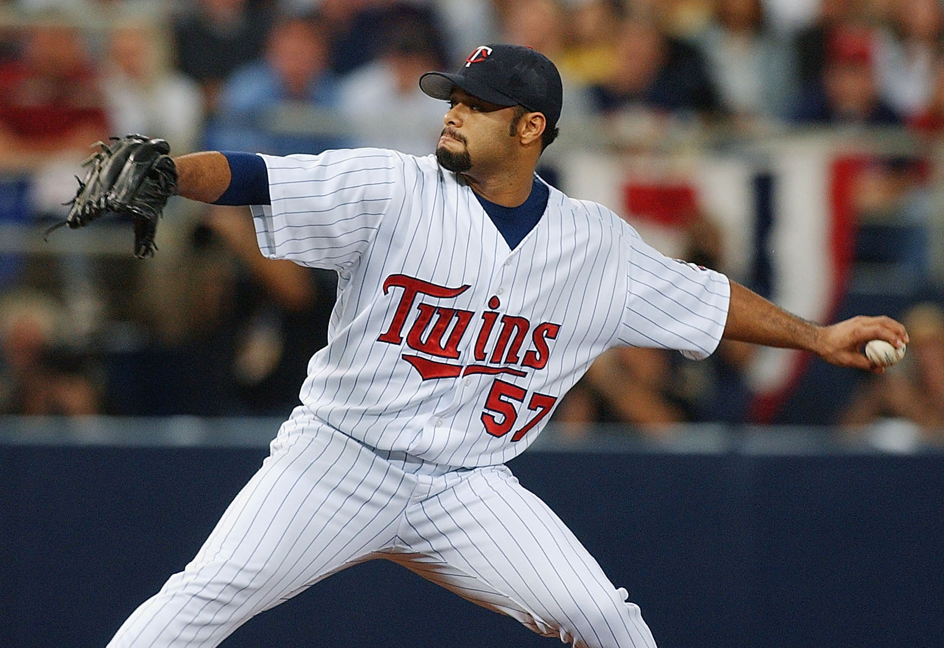 MINNEAPOLIS, MN - OCTOBER 9: Starting pitcher Johan Santana #57 of the Minnesota Twins pitches in the first inning against the New York Yankees during game four of the American League Divisional Series at the Hubert H. Humphrey Metrodome on October 9, 200