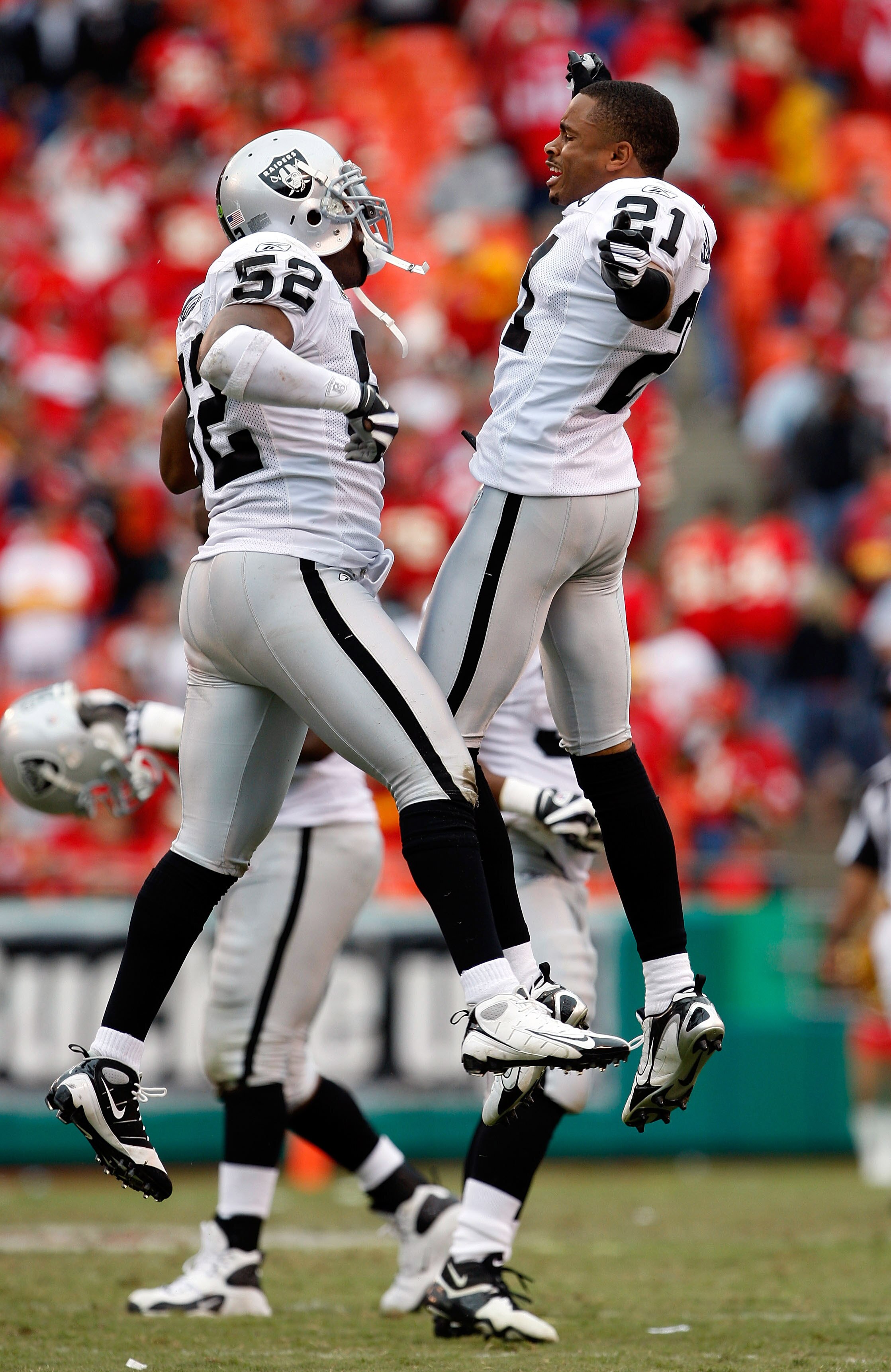 KANSAS CITY, MO - SEPTEMBER 14: Linebacker Kirk Morrison #52 of the Oakland Raiders is congratulated by Nnamdi Asomugha #21 after intercepting a pass late in the 4th quarter during the game on September 14, 2008 at Arrowhead Stadium in Kansas City, Missou