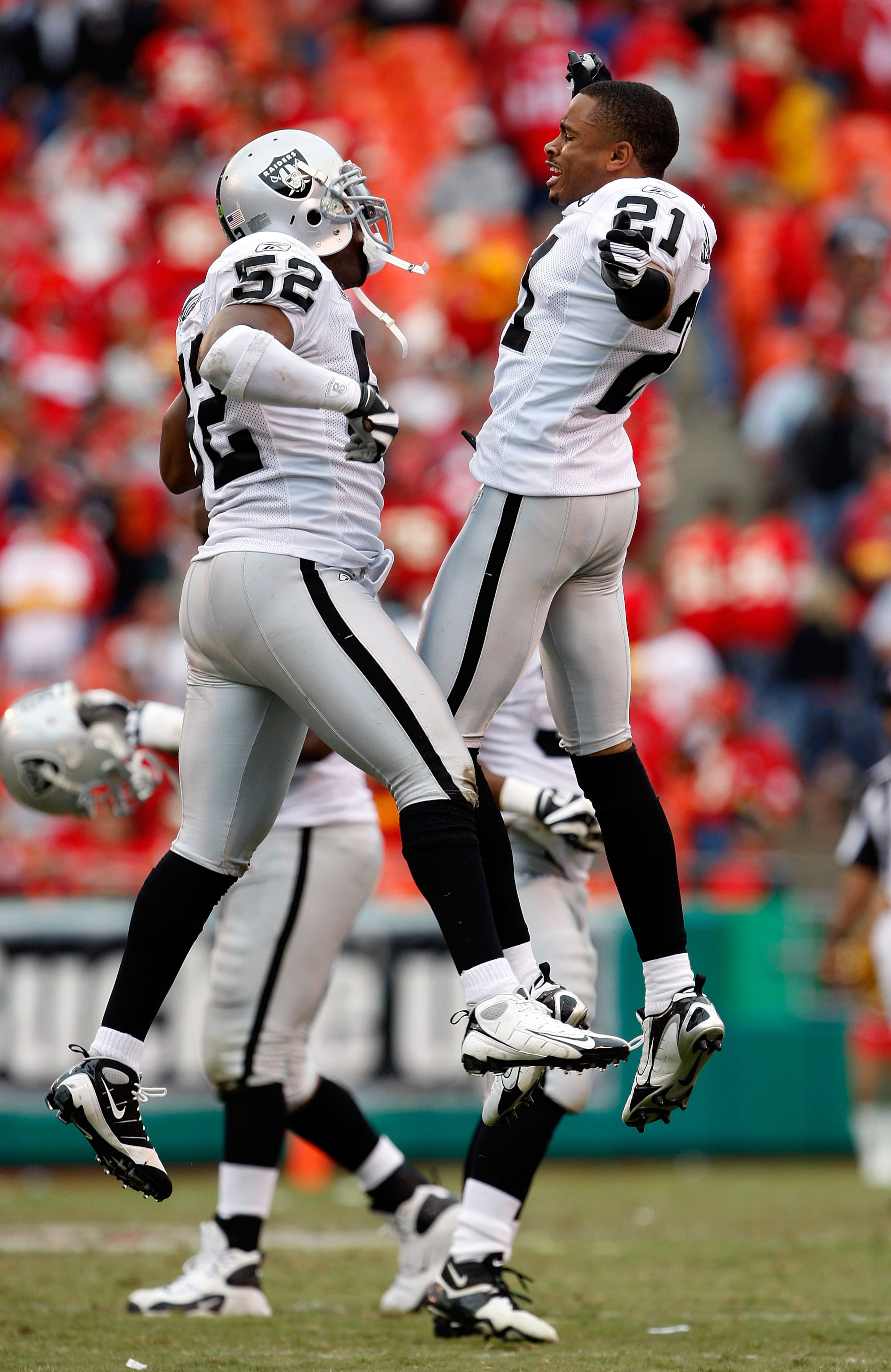 KANSAS CITY, MO - SEPTEMBER 14: Linebacker Kirk Morrison #52 of the Oakland Raiders is congratulated by Nnamdi Asomugha #21 after intercepting a pass late in the 4th quarter during the game on September 14, 2008 at Arrowhead Stadium in Kansas City, Missou