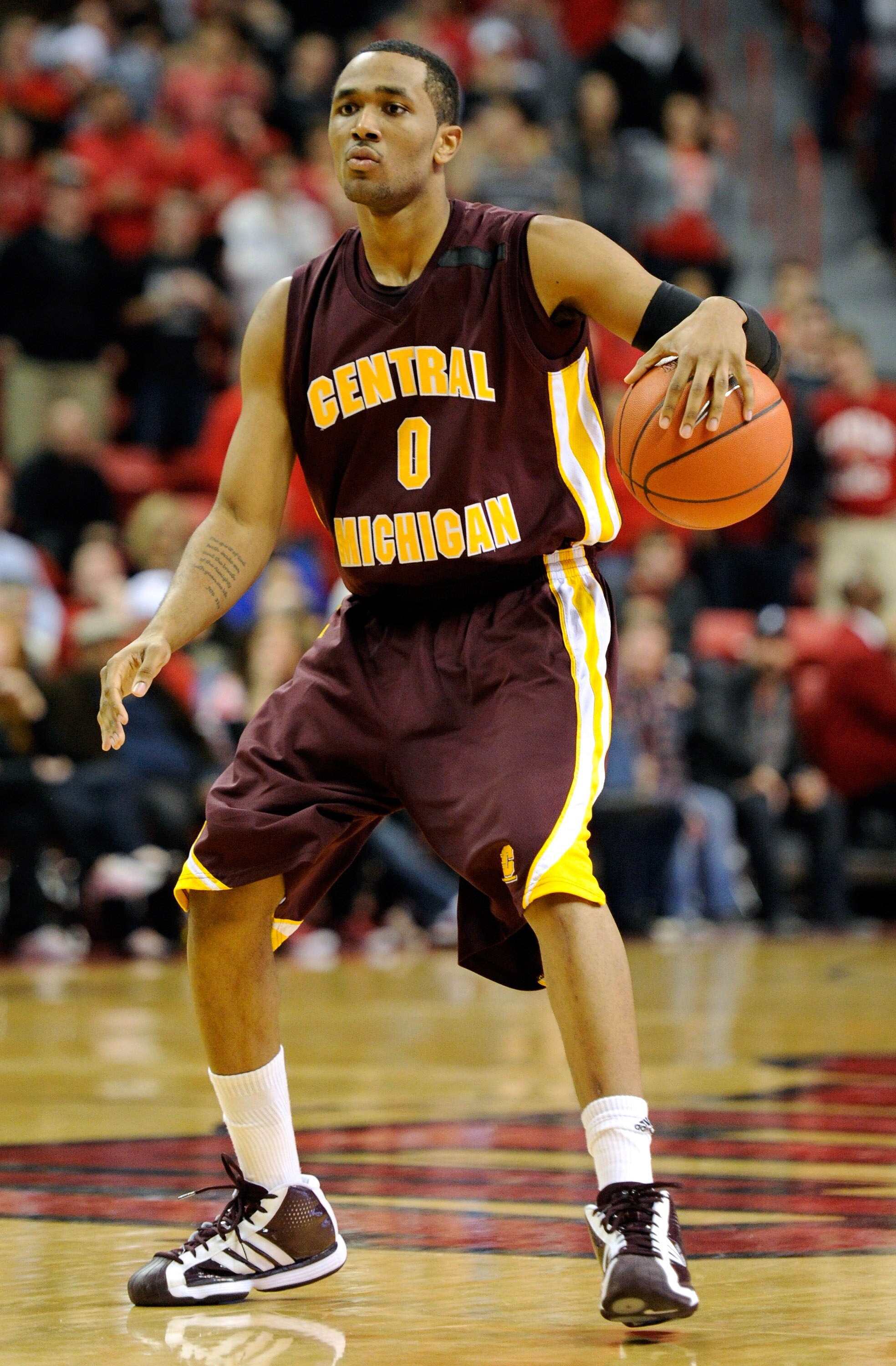 LAS VEGAS, NV - DECEMBER 30:  Trey Zeigler #0 of the Central Michigan Chippewas brings the ball up the court against the UNLV Rebels during their game at the Thomas & Mack Center December 30, 2010 in Las Vegas, Nevada. UNLV won 73-47.  (Photo by Ethan Mil