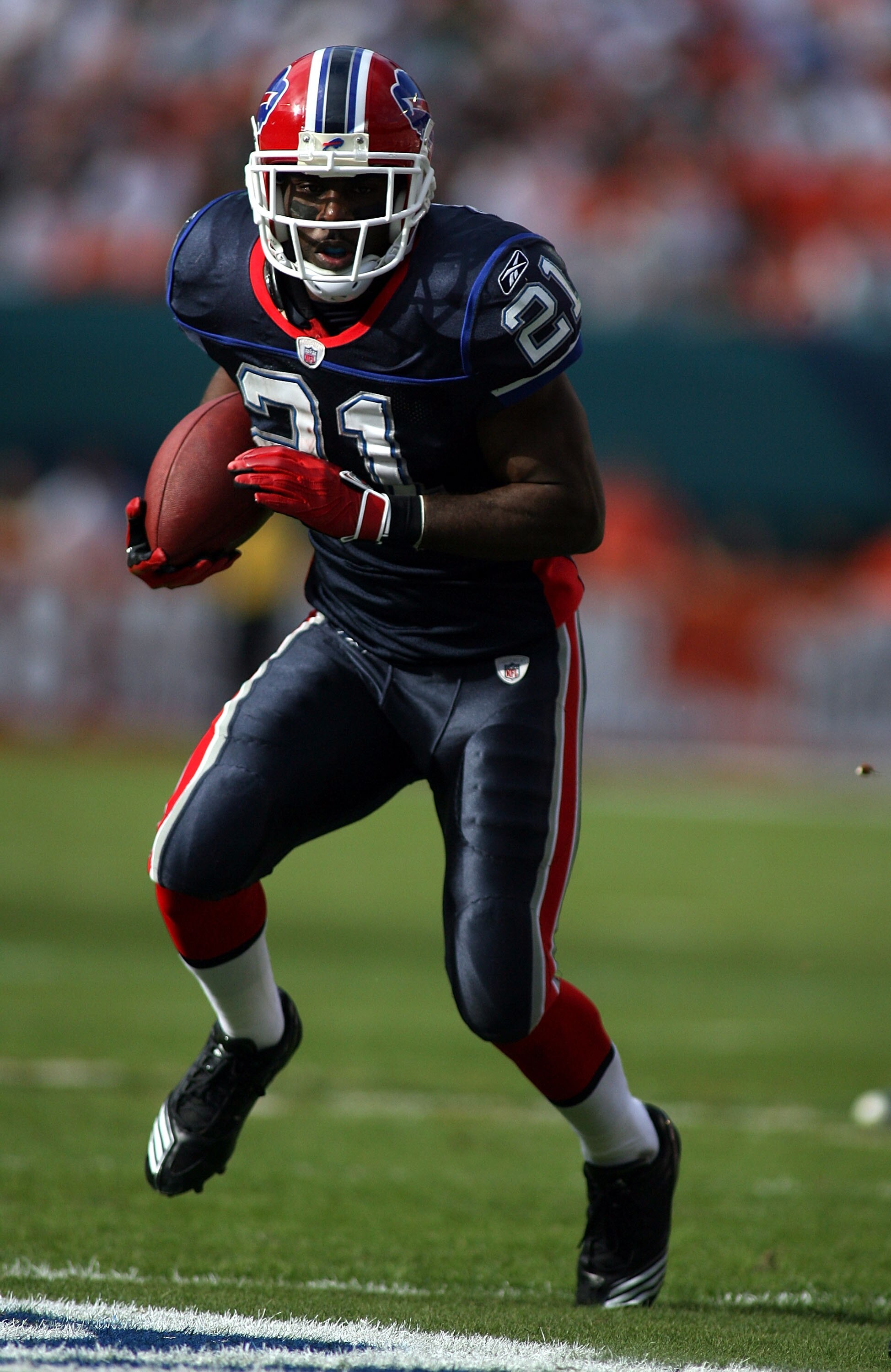 MIAMI - DECEMBER 19:  Running Back C.J. Spiller #21 of the Buffalo Bills runs against the Miami Dolphins at Sun Life Stadium on December 19, 2010 in Miami, Florida.The Bills defeated the Dolphins 17-14.  (Photo by Marc Serota/Getty Images)