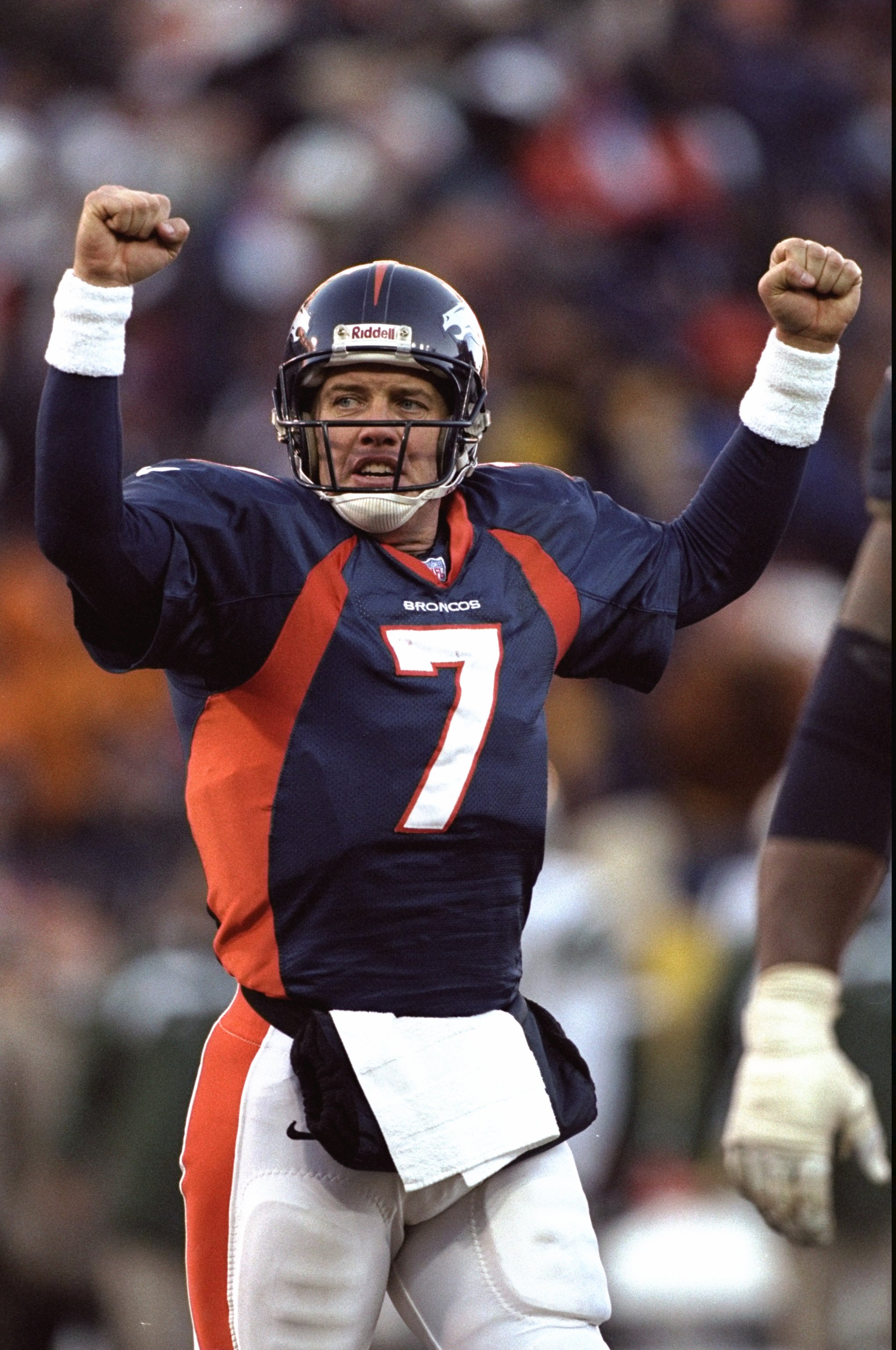 17 Jan 1999:  John Elway #7 of the Denver Broncos celebrates during the AFC Championship Game against the  New York Jets at Mile High Stadium in Denver, Colorado. The Broncos defeated the Jets 23-10. Mandatory Credit: Brian Bahr  /Allsport
