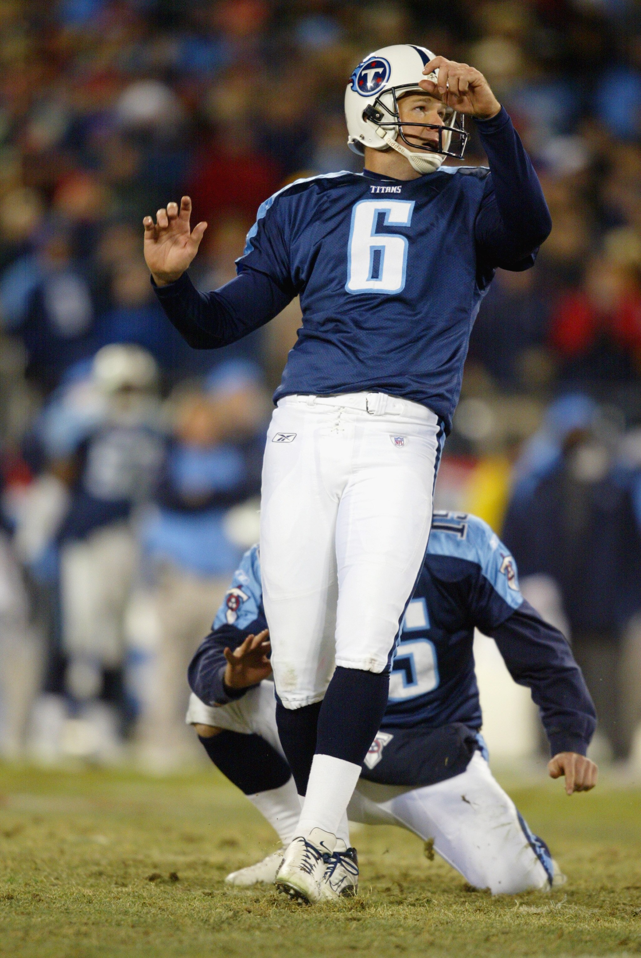 NASHVILLE, TN - JANUARY 11:  Joe Nedney #6 of the Tennessee Titans watches his field goal attempt during the AFC divisional playoff game against the Pittsburgh Steelers at the Coliseum on January 11, 2003 in Nashville, Tennessee.  The Titans won 34-31 in