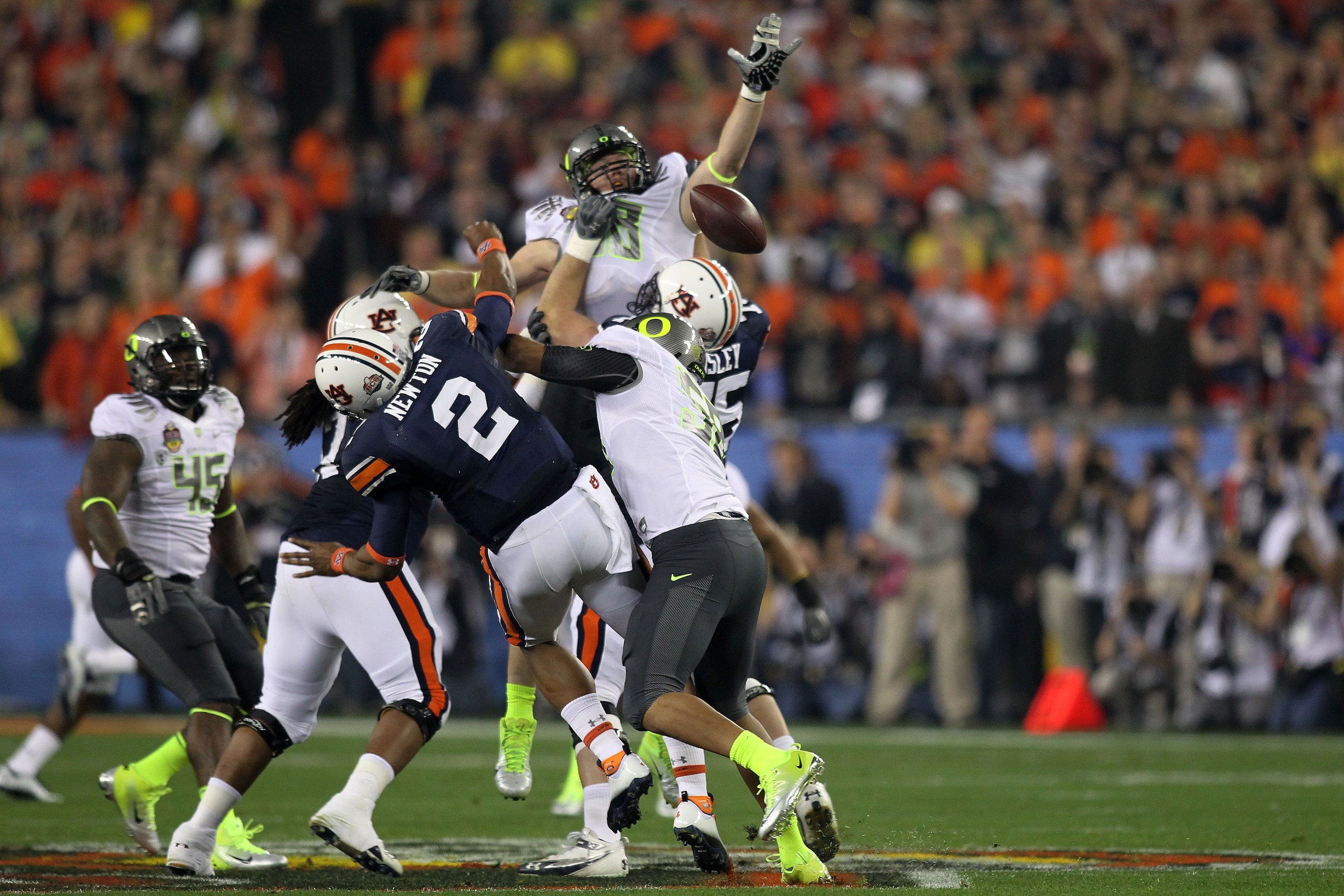 GLENDALE, AZ - JANUARY 10:  Cameron Newton #2 of the Auburn Tigers has a pass blocked by the Oregon Ducks during the Tostitos BCS National Championship Game at University of Phoenix Stadium on January 10, 2011 in Glendale, Arizona.  (Photo by Jonathan Fer