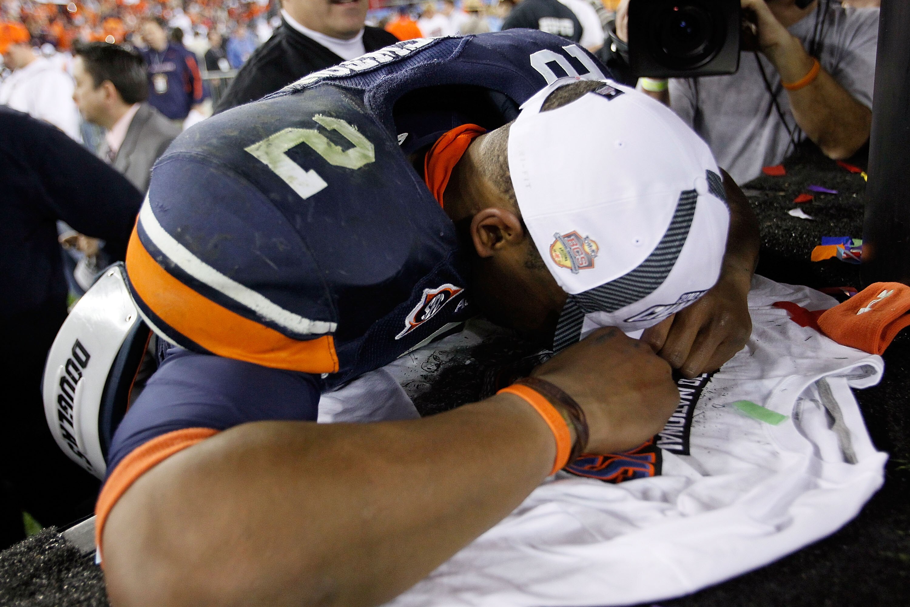 GLENDALE, AZ - JANUARY 10:  Quarterback Cameron Newton #2 of the Auburn Tigers celebrates the Tigers 22-19 victory against the Oregon Ducks in the Tostitos BCS National Championship Game at University of Phoenix Stadium on January 10, 2011 in Glendale, Ar