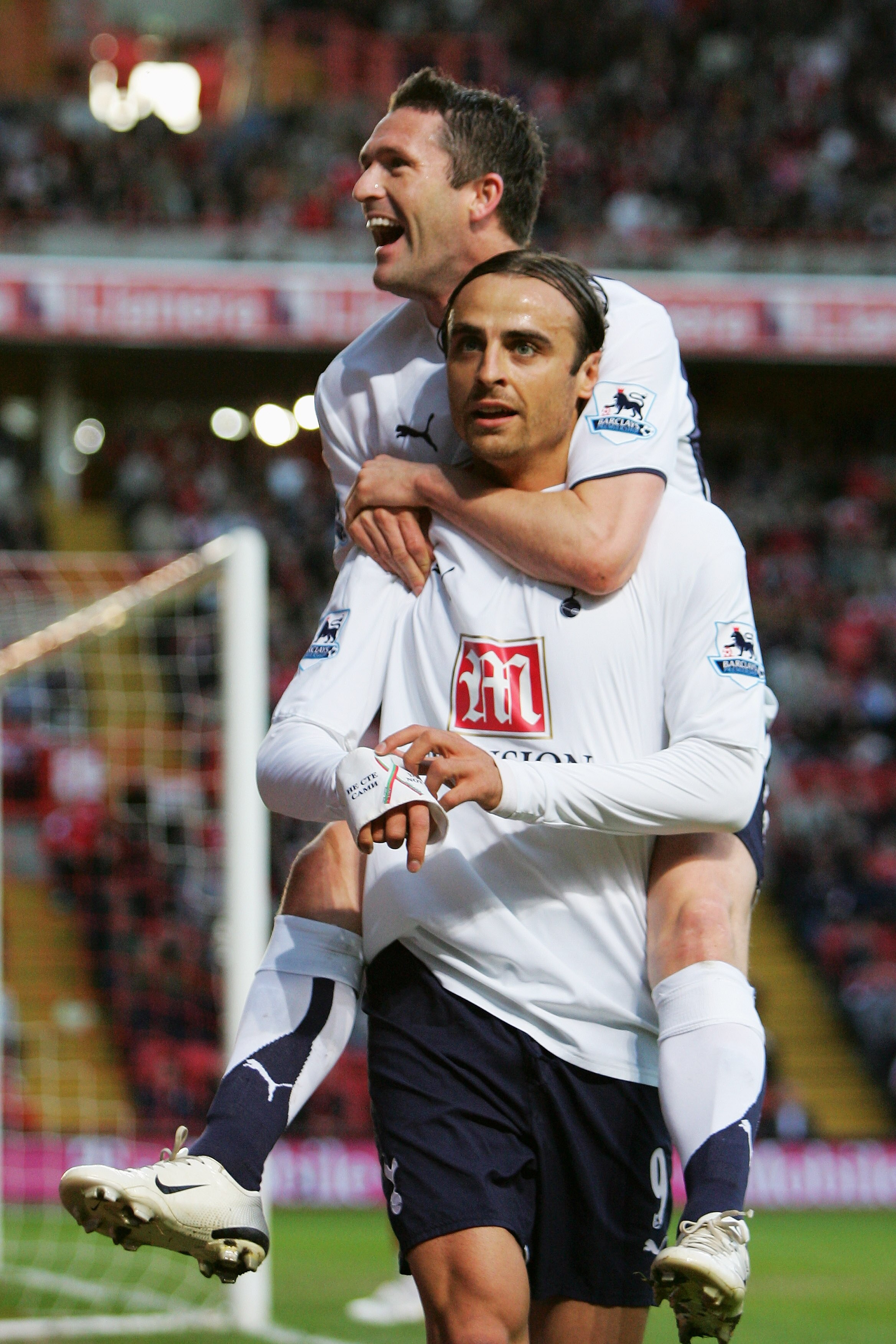 LONDON - MAY 07:  Dimitar Berbatov of Tottenham Hotspur is congratulated by team mate Robbie Keane after he scores the first goal of the game during the Barclays Premiership match between Charlton Athletic and Tottenham Hotspur at The Valley on May 7, 200