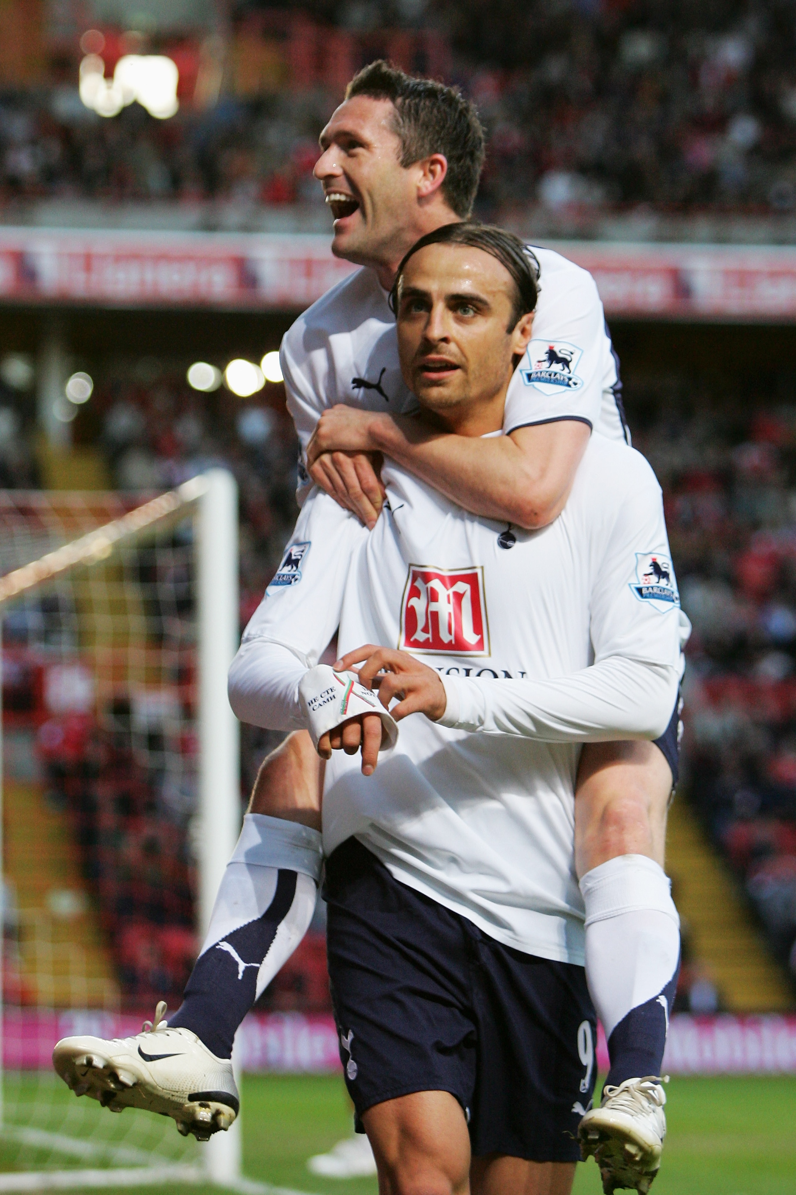 LONDON - MAY 07: Dimitar Berbatov of Tottenham Hotspur is congratulated by team mate Robbie Keane after he scores the first goal of the game during the Barclays Premiership match between Charlton Athletic and Tottenham Hotspur at The Valley on May 7, 200 LONDON - MAY 07: Dimitar Berbatov of Tottenham Hotspur is congratulated by team mate Robbie Keane after he scores the first goal of the game during the Barclays Premiership match between Charlton Athletic and Tottenham Hotspur at The Valley on May 7, 200
