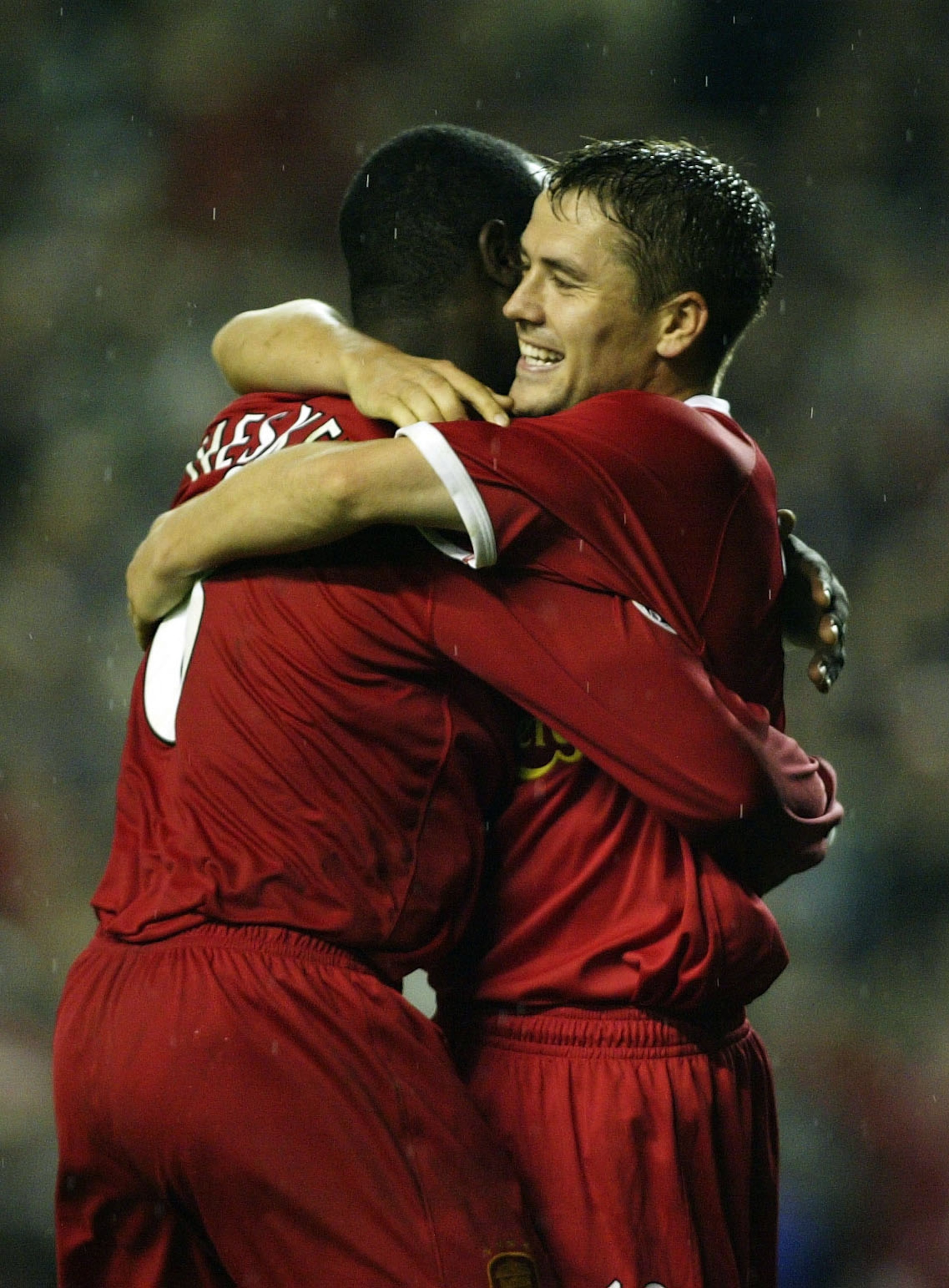 LIVERPOOL - OCTOBER 2: Emile Heskey of Liverpool celebrates with Michael Owen after scoring the fifth goal during the Liverpool v Spartak Moscow UEFA Champions League phase one, Group B match at Anfield on October 2, 2002 in Liverpool, England. (Photo by LIVERPOOL - OCTOBER 2: Emile Heskey of Liverpool celebrates with Michael Owen after scoring the fifth goal during the Liverpool v Spartak Moscow UEFA Champions League phase one, Group B match at Anfield on October 2, 2002 in Liverpool, England. (Photo by