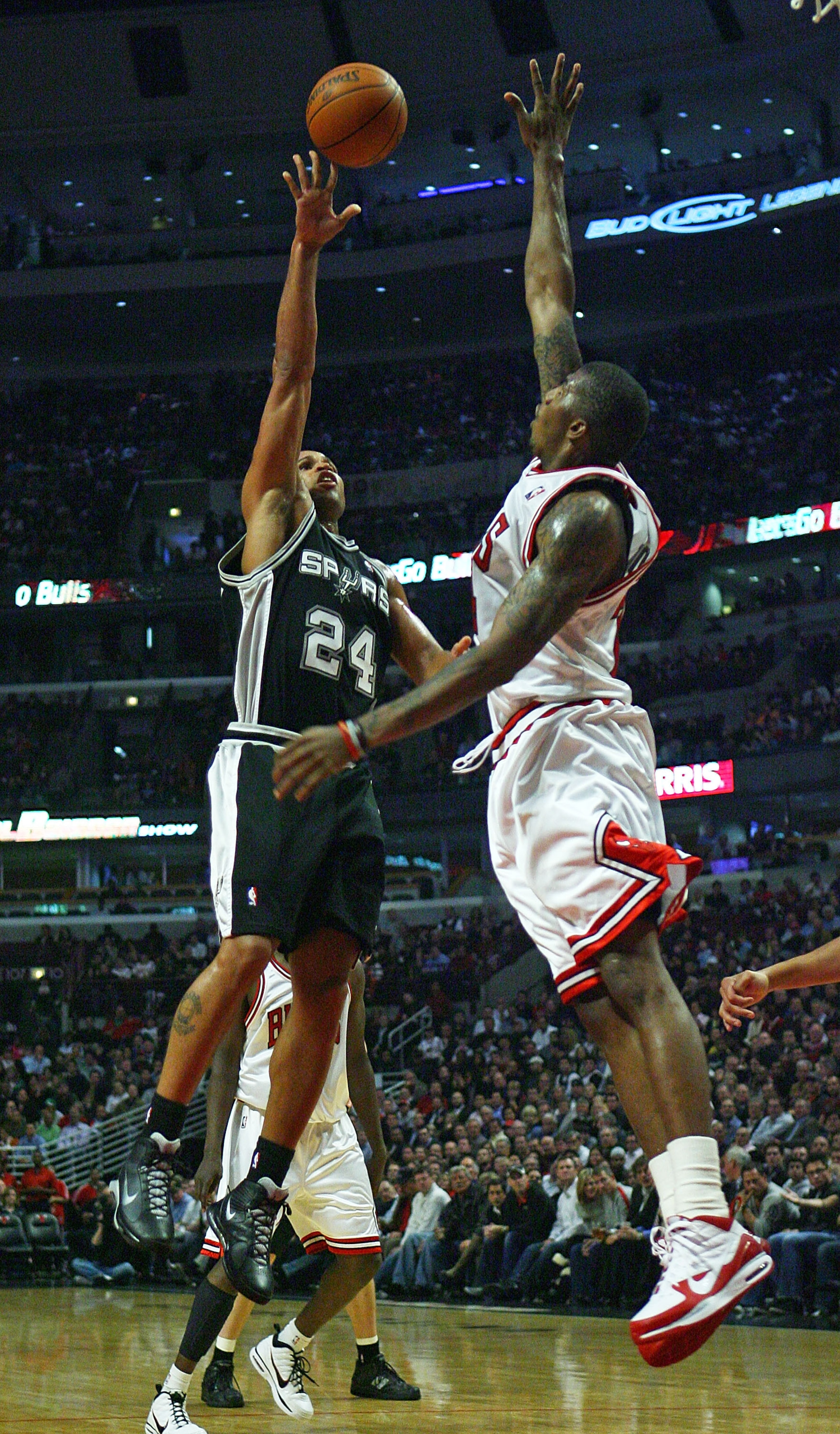 CHICAGO - OCTOBER 29:  Richard Jefferson #24 of the San Antonio Spurs puts up a shot over Tyrus Thomas #24 of the Chicago Bulls at the United Center on October 29, 2009 in Chicago, Illinois. NOTE TO USER: User expressly acknowledges and agrees that, by do