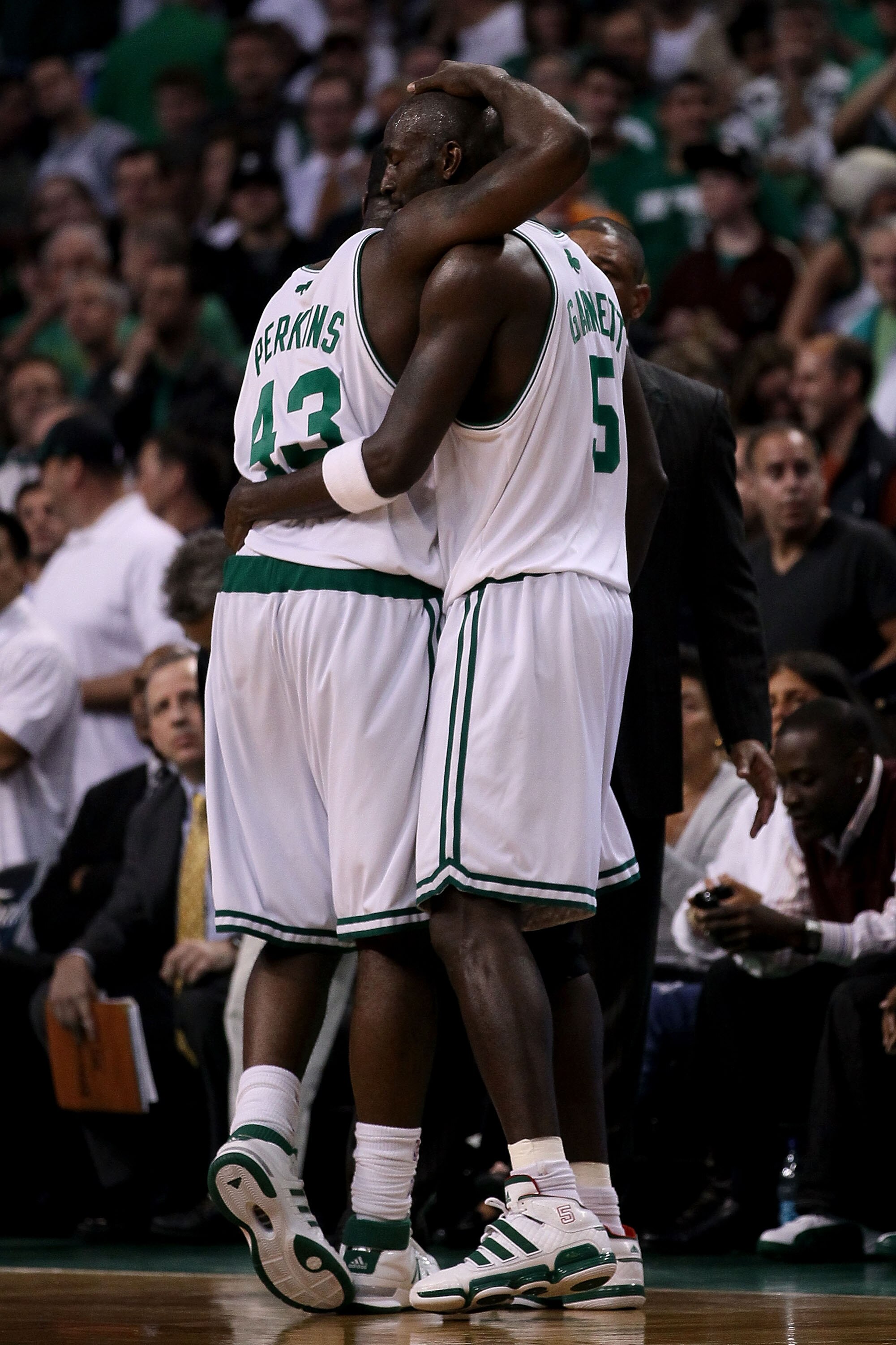 BOSTON - JUNE 10:  Kendrick Perkins #43 and Kevin Garnett #5 of the Boston Celltics hug near the side line during Game Four of the 2010 NBA Finals against the Los Angeles Lakers on June 10, 2010 at TD Garden in Boston, Massachusetts. NOTE TO USER: User ex