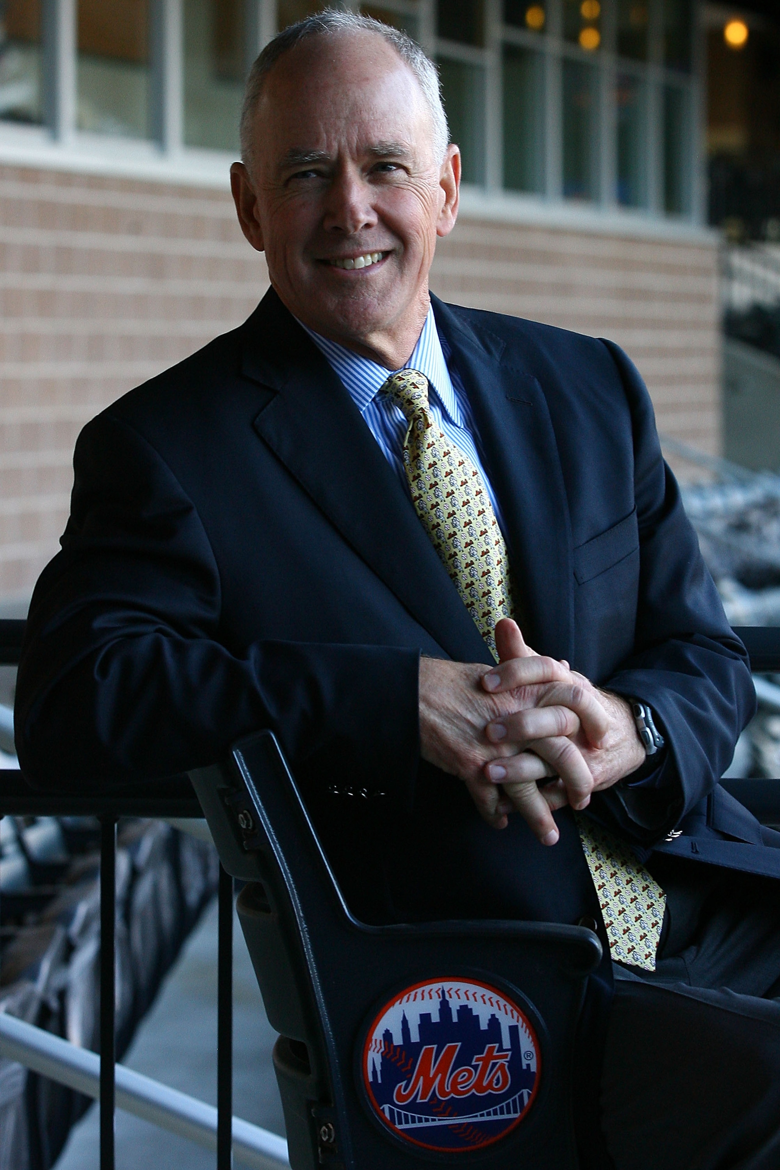 NEW YORK - OCTOBER 29:  Sandy Alderson poses for photographers after being introduced as the general manager for the New York Mets on October 29, 2010 at Citi Field in the Flushing neighborhood of the Queens borough of New York City.  (Photo by Andrew Bur