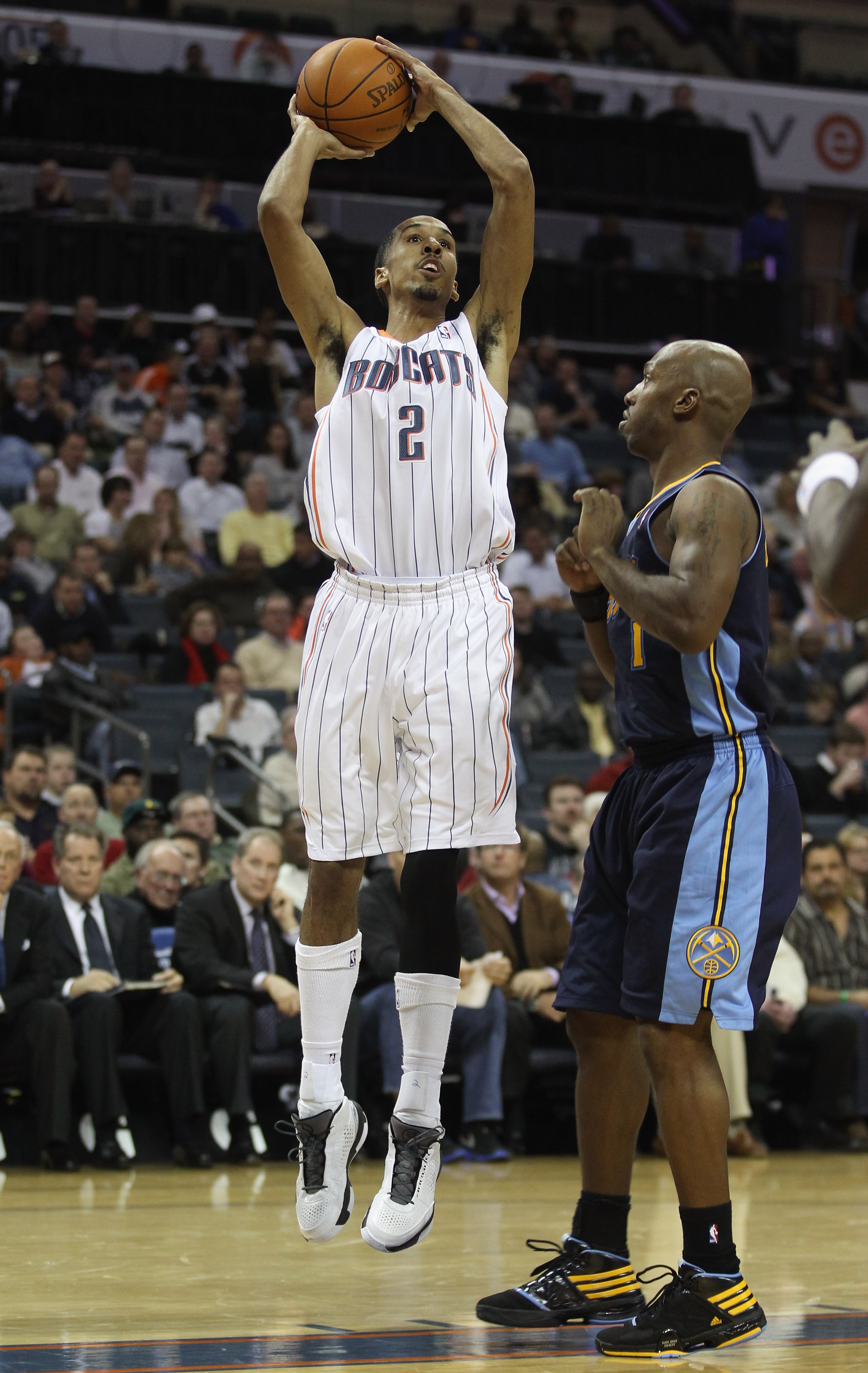 CHARLOTTE, NC - DECEMBER 07:  Chauncey Billups #1 of the Denver Nuggets watches a shot by Shaun Livingston #2 of the Charlotte Bobcats during their game at Time Warner Cable Arena on December 7, 2010 in Charlotte, North Carolina.  NOTE TO USER: User expre