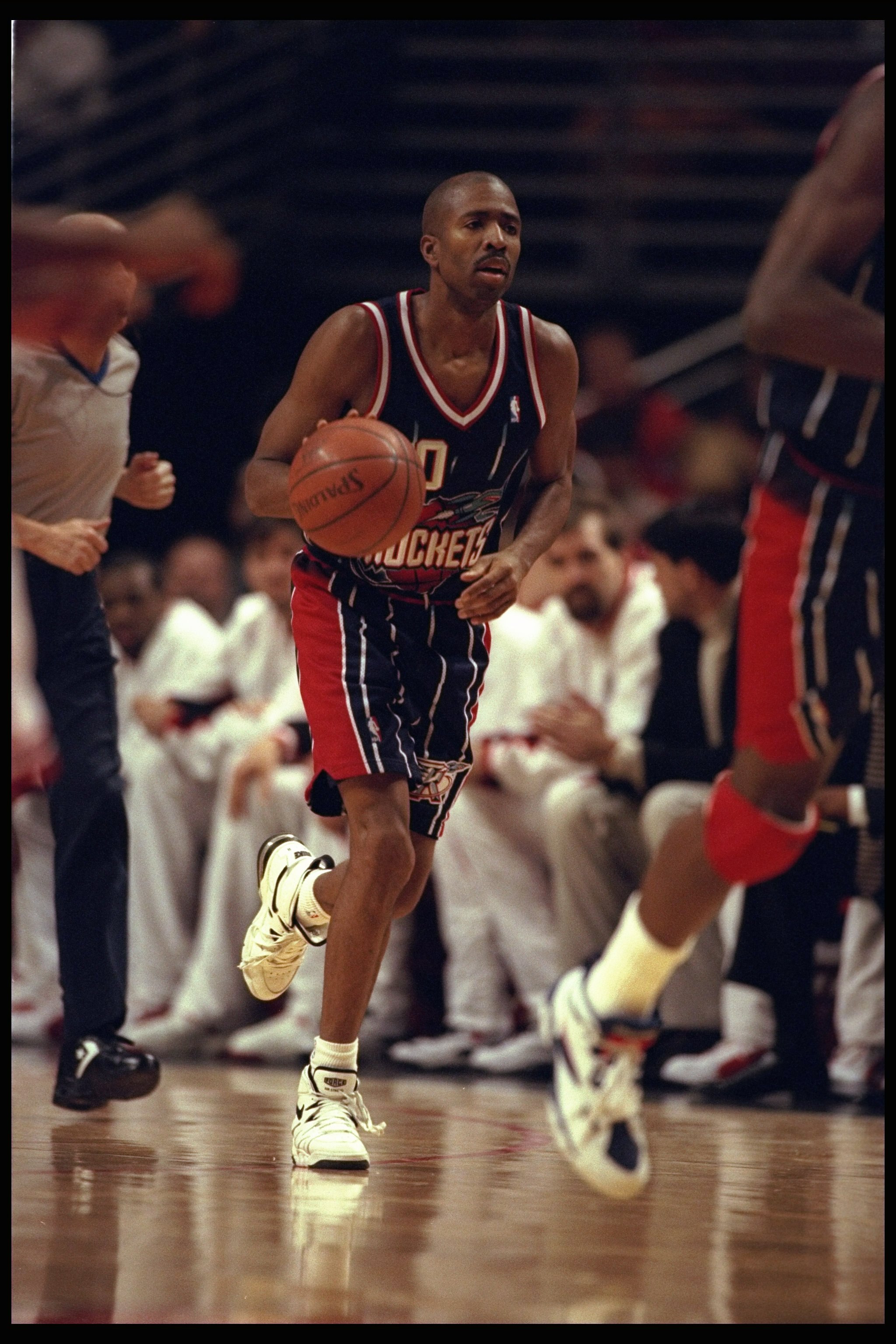 3 Jan 1996:  Kenny Smith of the Houston Rockets moves downcourt against the Chicago Bulls during a game played at the United Center in Chicago, Illinois.  The Bulls won the game, 100-86. Mandatory Credit: Jonathan Daniel/Allsport