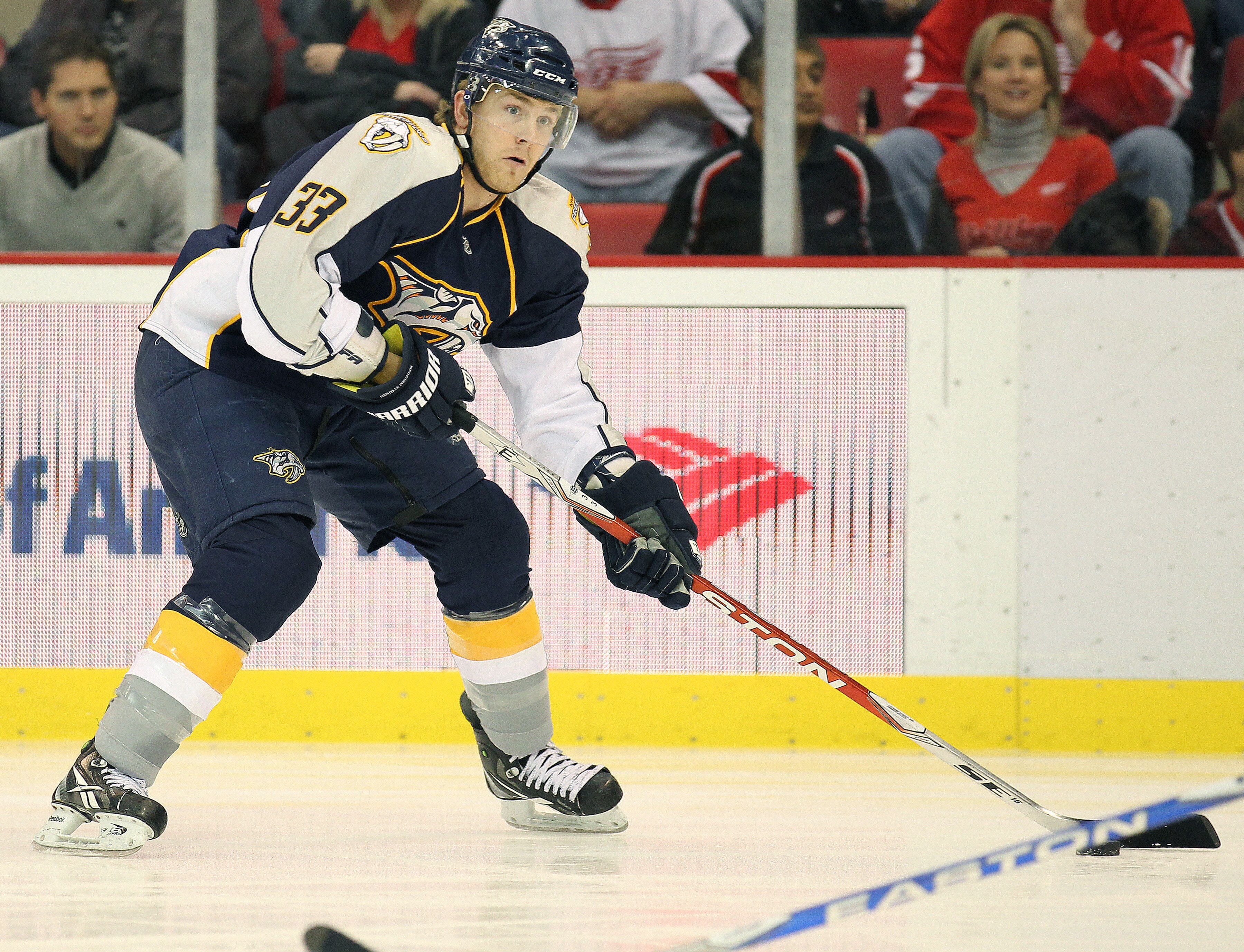 DETROIT - OCTOBER 30:  Colin Wilson #33 of the Nashville Predators gets set to make a pass in a game against the Detroit Red Wings on October 30,2010 at the Joe Louis Arena in Detroit , Michigan. The Wings defeated the Predators 5-2. (Photo by Claus Ander