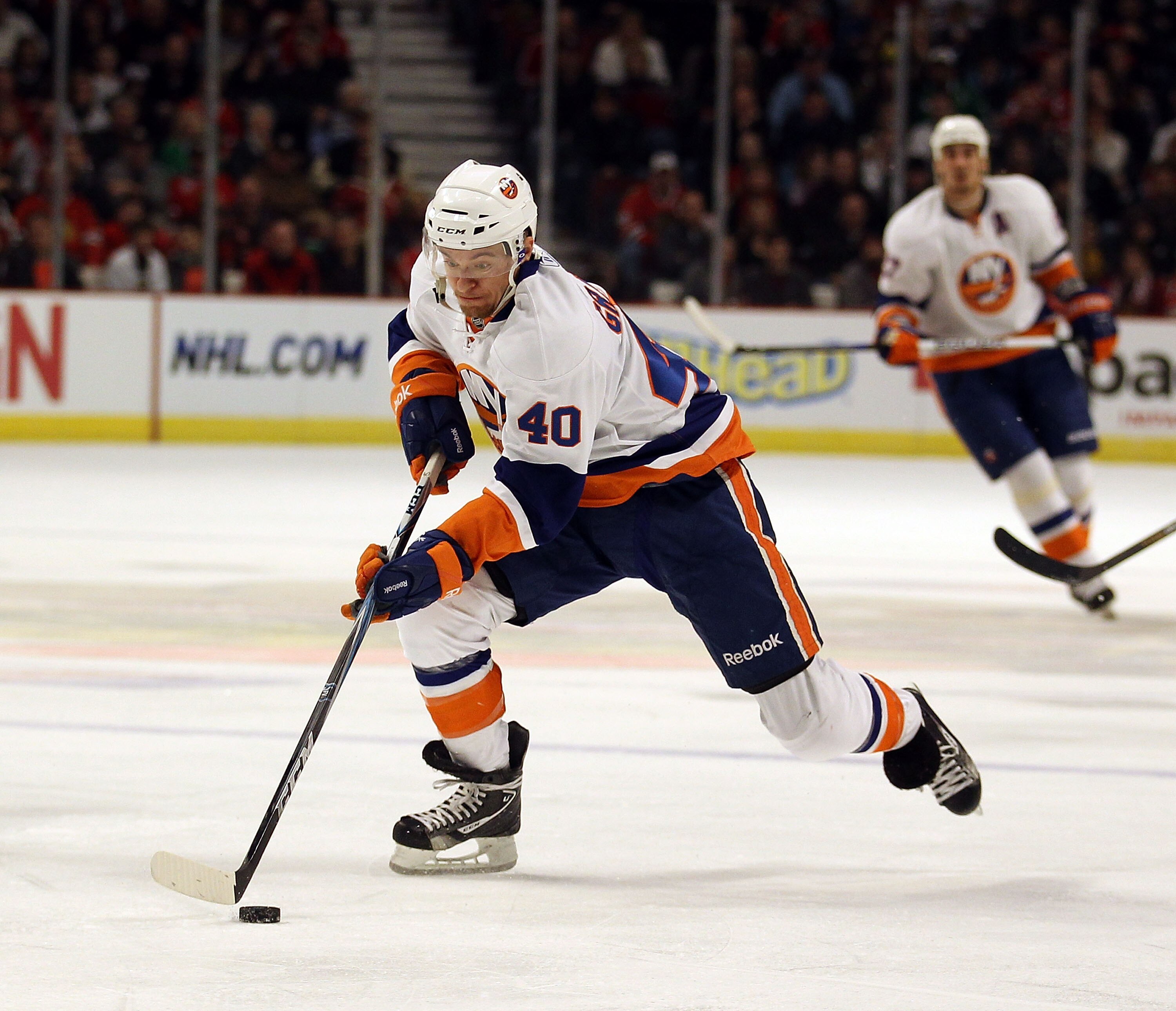 CHICAGO, IL - JANUARY 09: Michael Grabner #40 of the New York Islanders skates up the ice against the Chicago Blackhawks at the United Center on January 9, 2011 in Chicago, Illinois. The Blackhawks defeated the Islanders 5-0. (Photo by Jonathan Daniel/Get