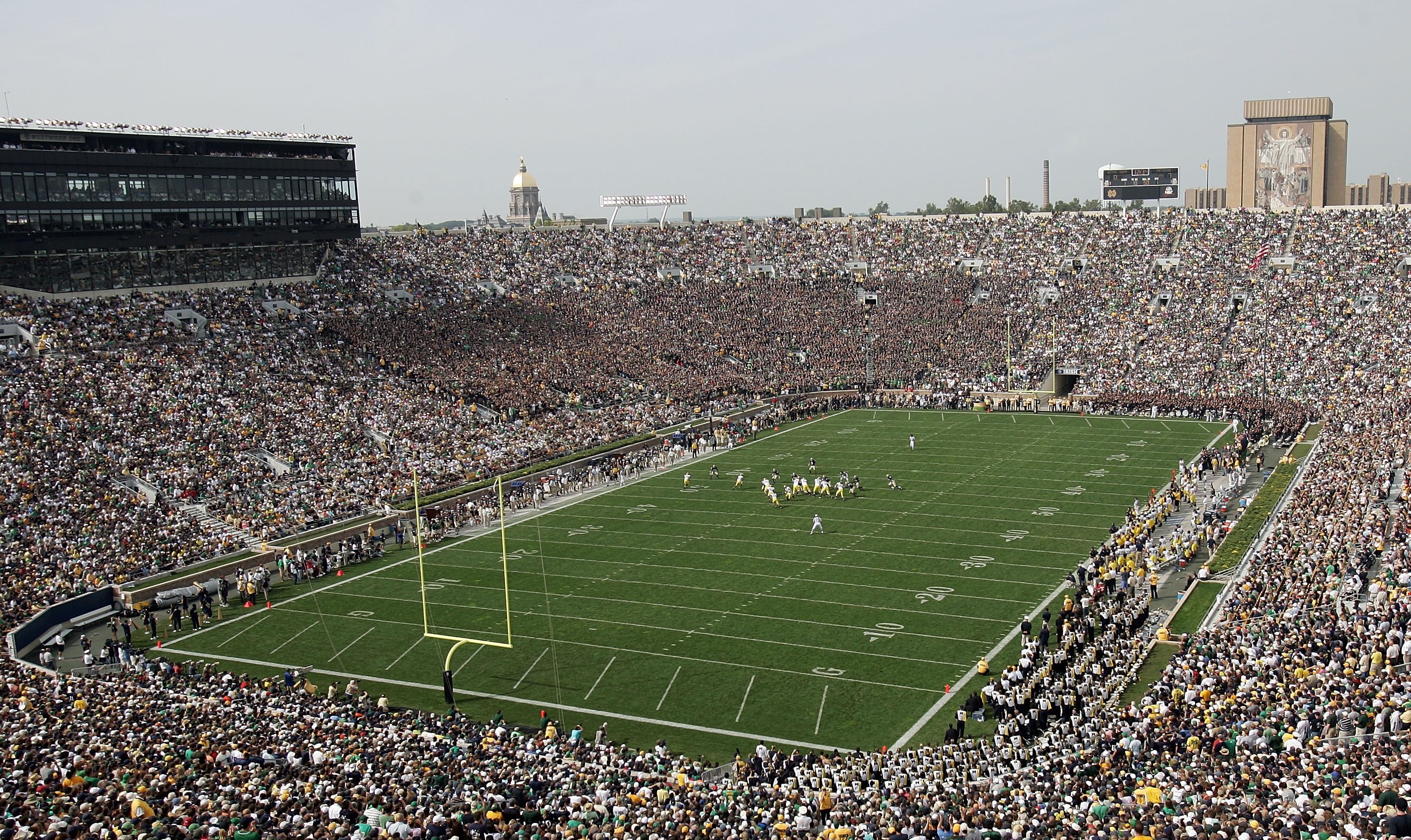 SOUTH BEND, IN - SEPTEMBER 16:  A general view is seen as the Michigan Wolverines run an offensive play against the defense of the Notre Dame Fighting Irish September 16, 2006 at Notre Dame Stadium in South Bend, Indiana.  (Photo by Chris Chambers/Getty I