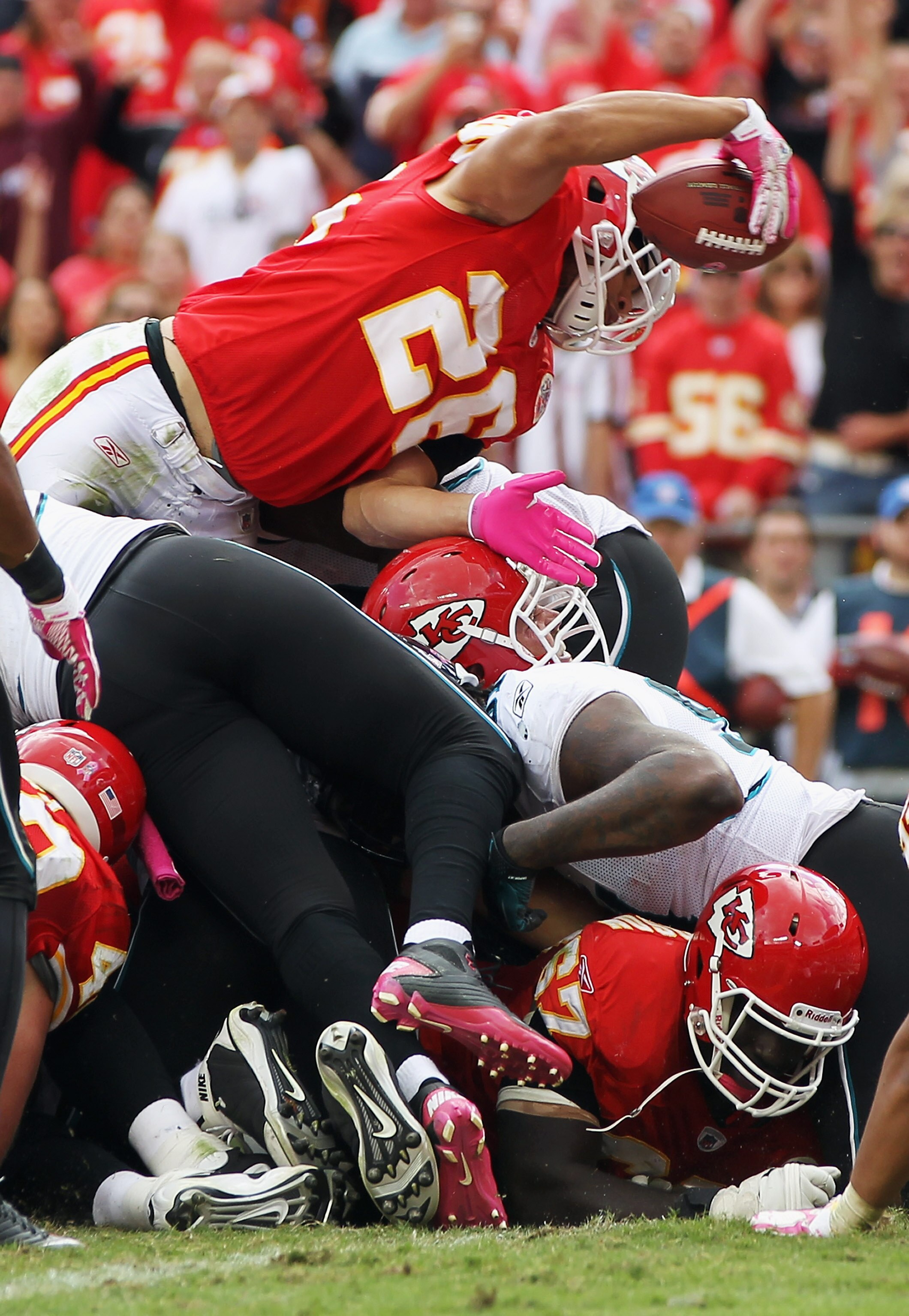 KANSAS CITY, MO - OCTOBER 24:  Running back Jackie Battle #26 of the Kansas City Chiefs carries the ball over the top of the defense to score a touchdown during the game against the Jacksonville Jaguars on October 24, 2010 at Arrowhead Stadium in Kansas C