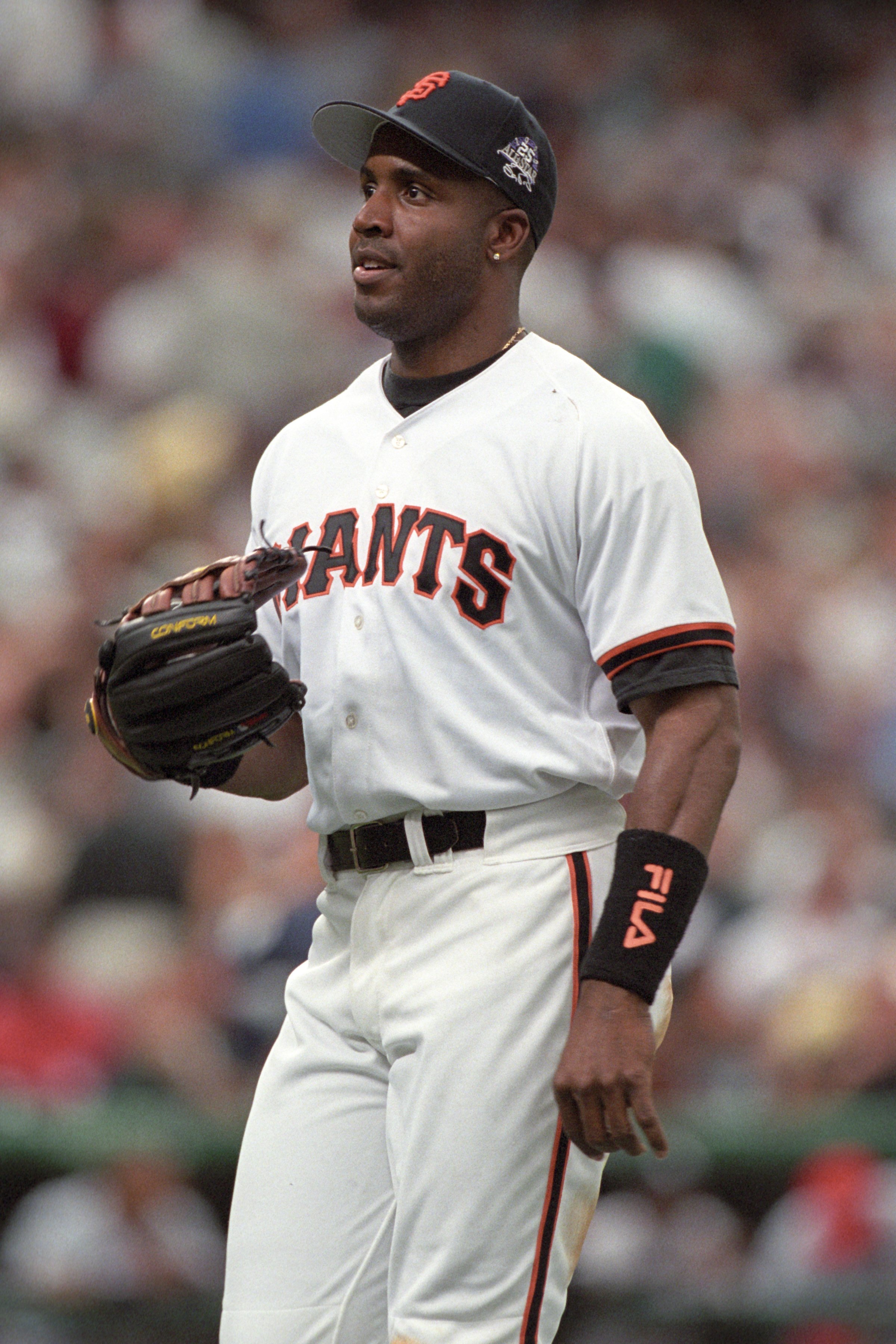DENVER - JULY 7:  Barry Bonds looks on during the 69th MLB All-Star Game at Coors Field on July 7, 1998 in Denver, Colorado. (Photo by Brian Bahr/Getty Images)
