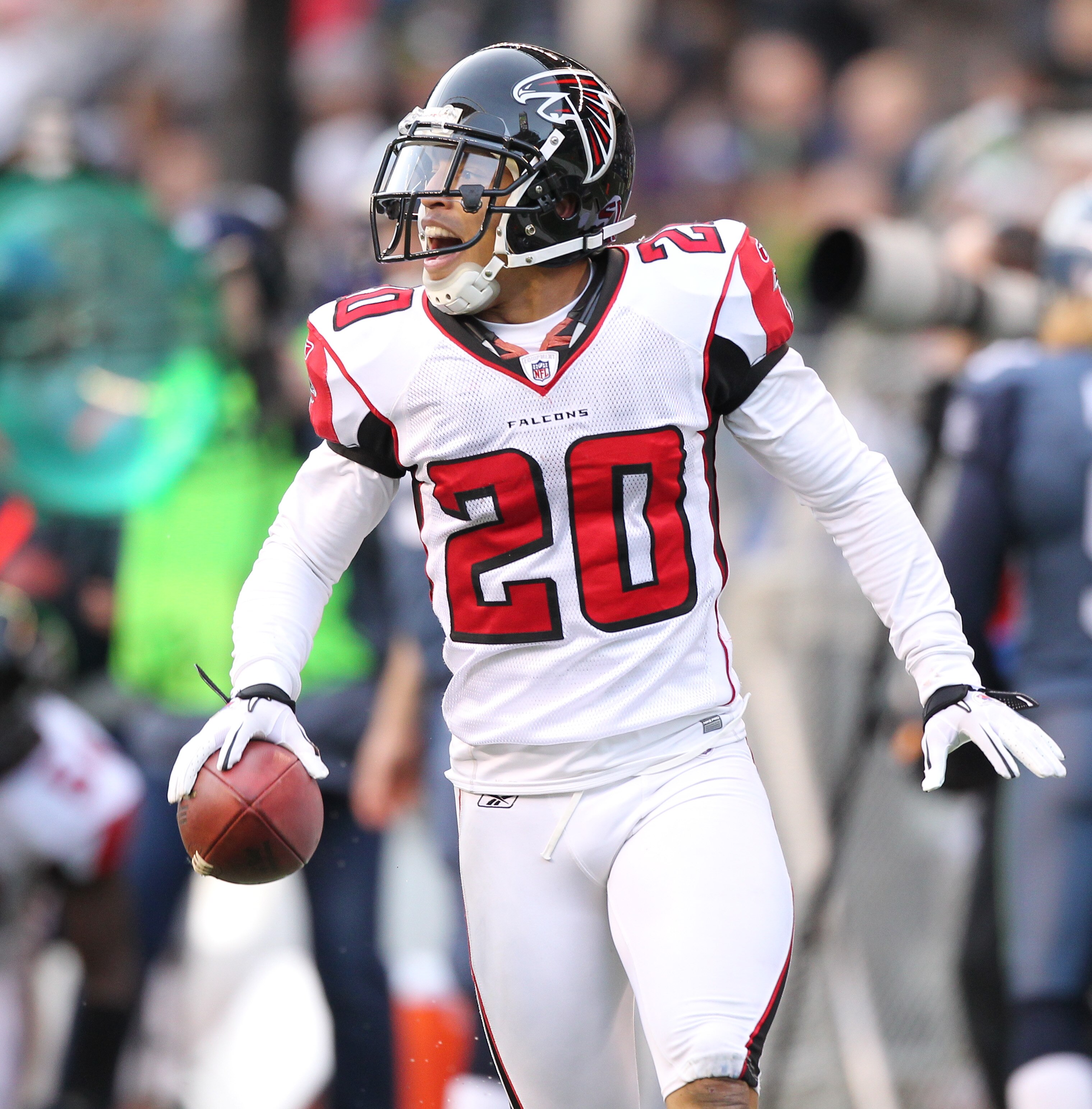 SEATTLE, WA - DECEMBER 19:  Brent Grimes #20 of the Atlanta Falcons celebrates after making an interception against the Seattle Seahawks at Qwest Field on December 19, 2010 in Seattle, Washington. The Falcons defeated the Seahawks 34-18. (Photo by Otto Gr