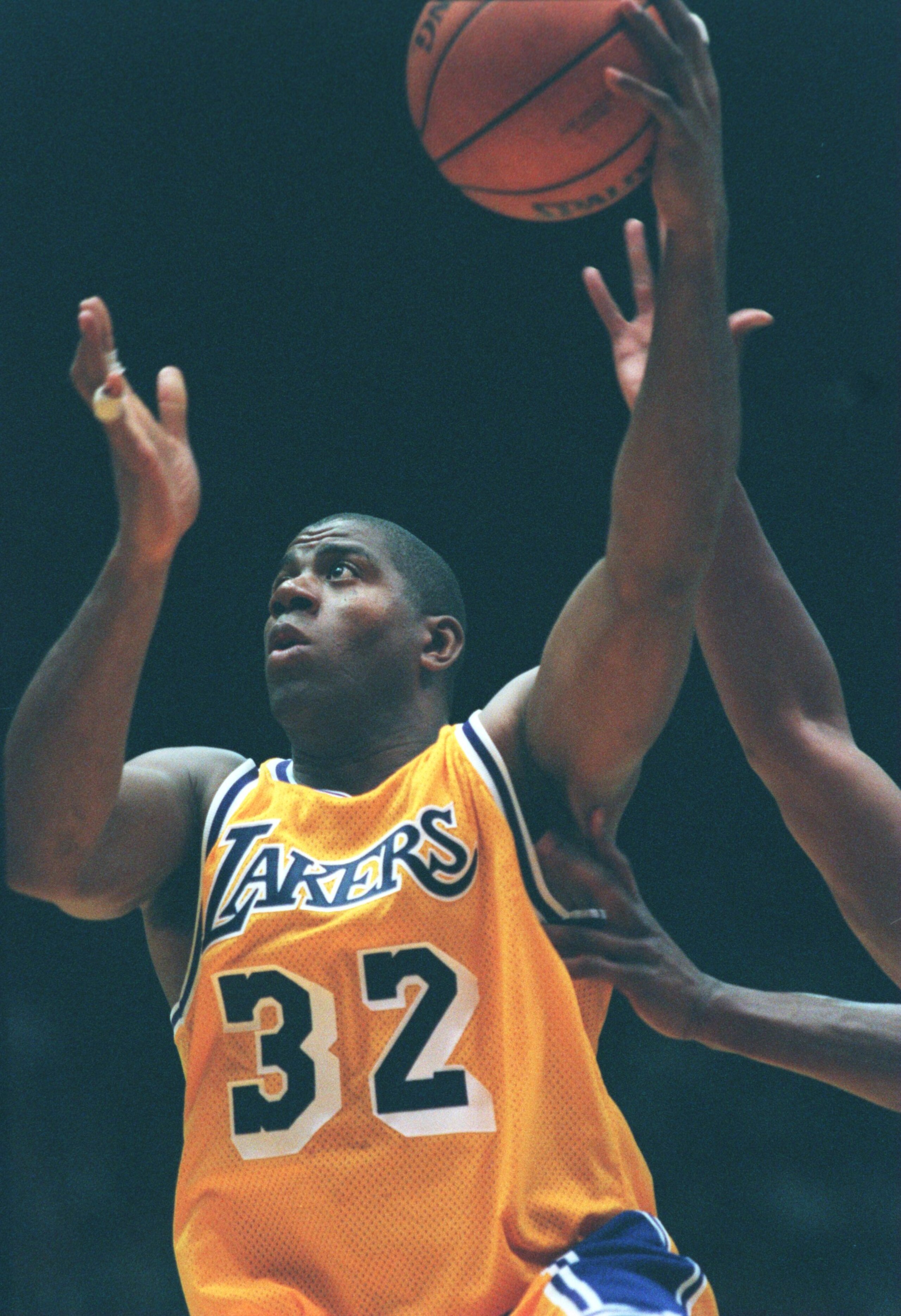 31 Jan 1996: Earvin Magic Johnson #32 of the Los Angeles Lakers drives to the basket in his return to the NBA during the game against the Golden State Warriors at the Great Western Forum in Inglewood, California.