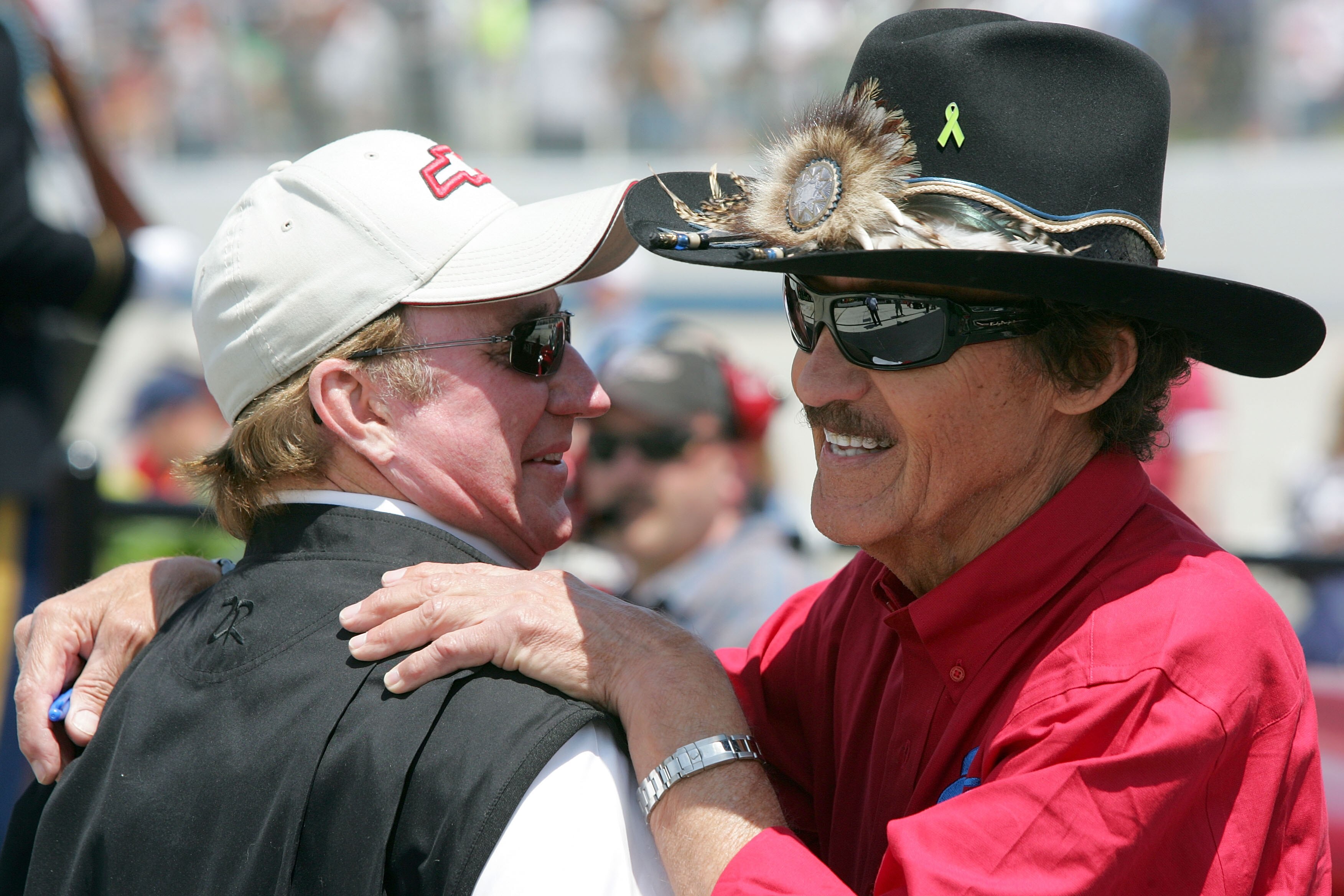 DOVER, DE - MAY 16:  Team owners Richard Childress (L) and Richard Petty (R) hug on the grid prior to the start of the NASCAR Sprint Cup Series Autism Speaks 400 at Dover International Speedway on May 16, 2010 in Dover, Delaware.  (Photo by Jerry Markland