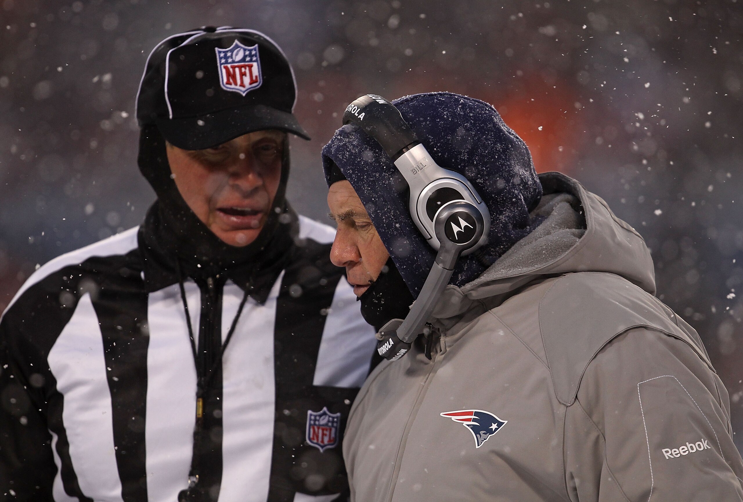 CHICAGO, IL - DECEMBER 12: Head coach Bill Belichick of the New England Patriots talks with a referee during a game against the Chicago Bears at Soldier Field on December 12, 2010 in Chicago, Illinois. The Patriots defeated the Bears 36-7. (Photo by Jonat CHICAGO, IL - DECEMBER 12: Head coach Bill Belichick of the New England Patriots talks with a referee during a game against the Chicago Bears at Soldier Field on December 12, 2010 in Chicago, Illinois. The Patriots defeated the Bears 36-7. (Photo by Jonat