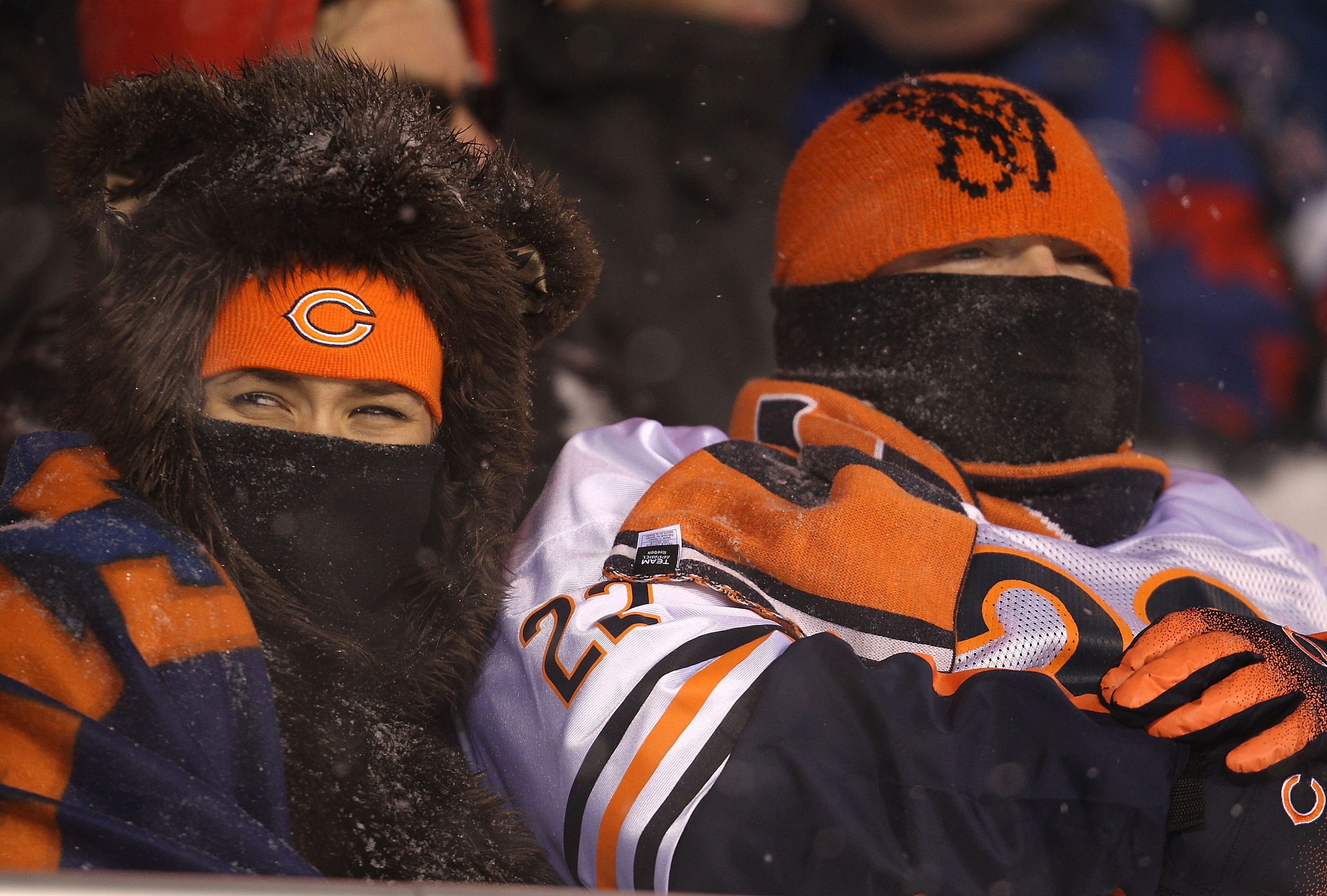 CHICAGO - DECEMBER 12: Fans of the Chicago Bears try to stay warm as they watch the Bears take on the New England Patriots at Soldier Field on December 12, 2010 in Chicago, Illinois. The Patriots defeated the Bears 36-7. (Photo by Jonathan Daniel/Getty Im CHICAGO - DECEMBER 12: Fans of the Chicago Bears try to stay warm as they watch the Bears take on the New England Patriots at Soldier Field on December 12, 2010 in Chicago, Illinois. The Patriots defeated the Bears 36-7. (Photo by Jonathan Daniel/Getty Im