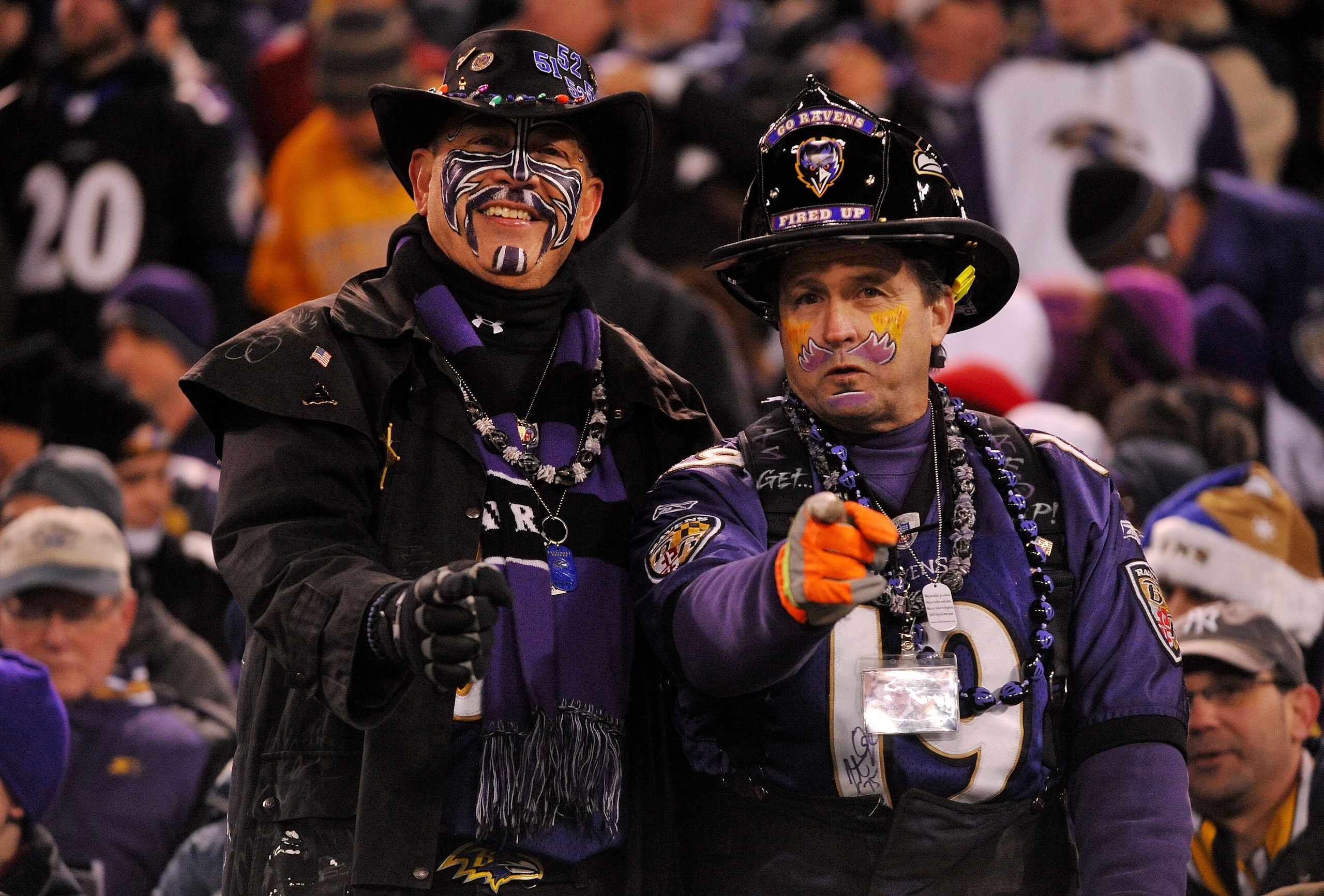 BALTIMORE, MD - DECEMBER 05: Fans of the Baltimore Ravens smile for a photo during the second quarter of the game against the Pittsburgh Steelers at M&T Bank Stadium on December 5, 2010 in Baltimore, Maryland. (Photo by Larry French/Getty Images) BALTIMORE, MD - DECEMBER 05: Fans of the Baltimore Ravens smile for a photo during the second quarter of the game against the Pittsburgh Steelers at M&T Bank Stadium on December 5, 2010 in Baltimore, Maryland. (Photo by Larry French/Getty Images)
