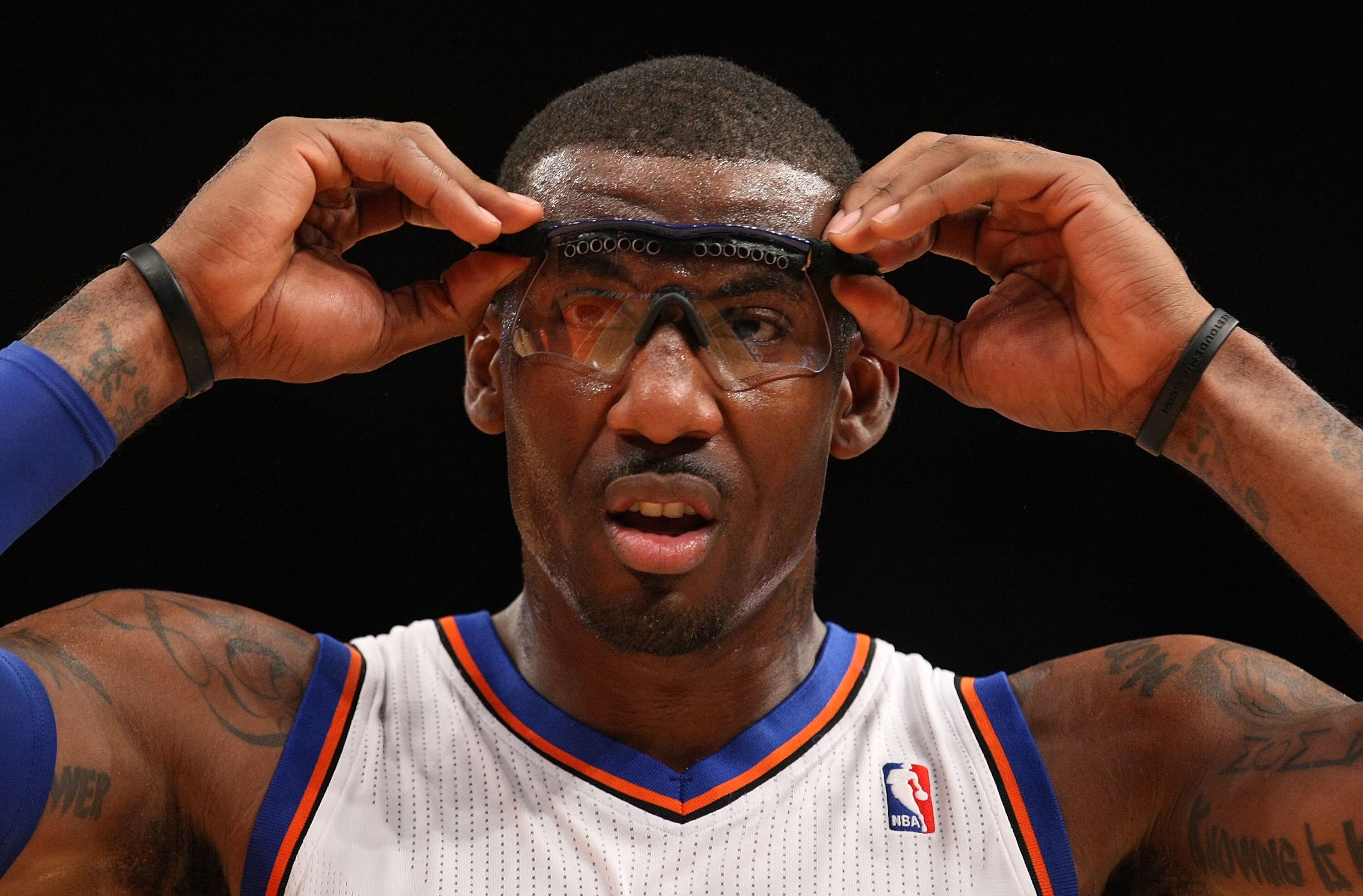 NEW YORK, NY - DECEMBER 17:  Amar'e Stoudemire #1 of the New York Knicks adjusts his goggles against  the Miami Heat at Madison Square Garden on December 17, 2010 in New York City. NOTE TO USER: User expressly acknowledges and agrees that, by downloading