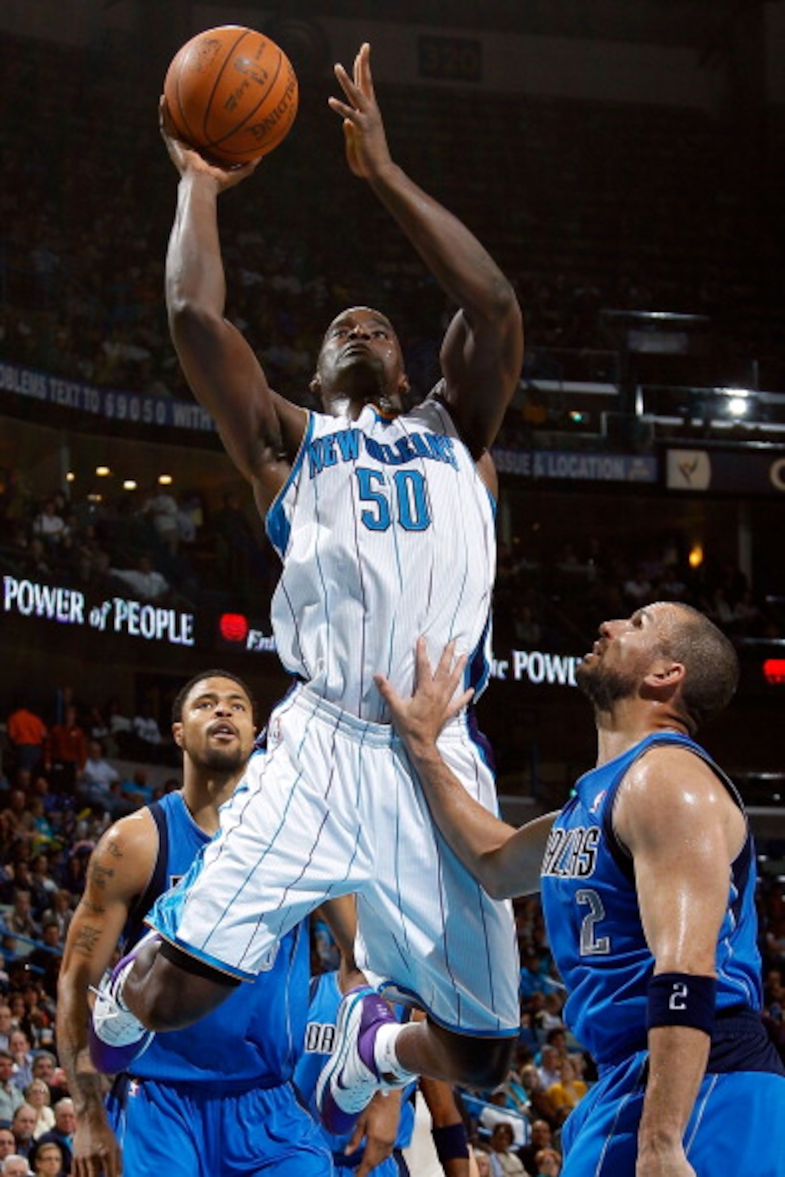 NEW ORLEANS - NOVEMBER 17: Emeka Okafor #50 of the New Orleans Hornets shoots the ball over Jason Kidd #2 of the Dallas Mavericks at the New Orleans Arena on November 17, 2010 in New Orleans, Louisiana. NOTE TO USER: User expressly acknowledges and agre NEW ORLEANS - NOVEMBER 17: Emeka Okafor #50 of the New Orleans Hornets shoots the ball over Jason Kidd #2 of the Dallas Mavericks at the New Orleans Arena on November 17, 2010 in New Orleans, Louisiana. NOTE TO USER: User expressly acknowledges and agre