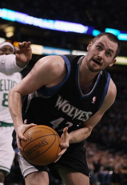 BOSTON, MA - JANUARY 03:  Kevin Love #42 of the Minnesota Timberwolves grabs the rebound in the first half against the Boston Celtics on January 3, 2011 at the TD Garden in Boston, Massachusetts. NOTE TO USER: User expressly acknowledges and agrees that,