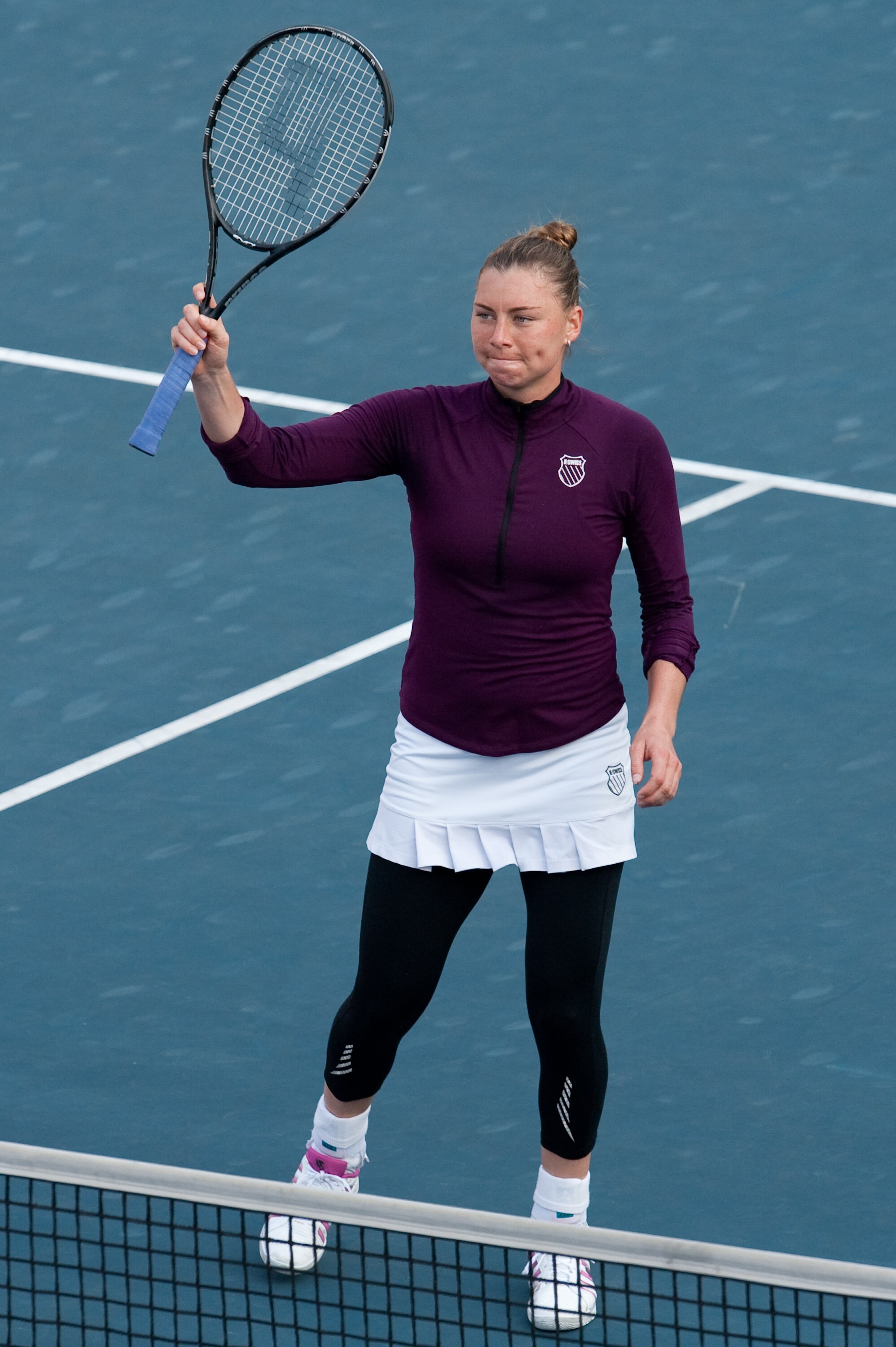HONG KONG - JANUARY 08:  Vera Zvonareva of Russia greets the crowd after winning her match against Caroline Wozniacki of Denmark during day four of the Hong Kong Tennis Classic 2011 on January 8, 2011 in Hong Kong, China.  (Photo by Victor Fraile/Getty Im