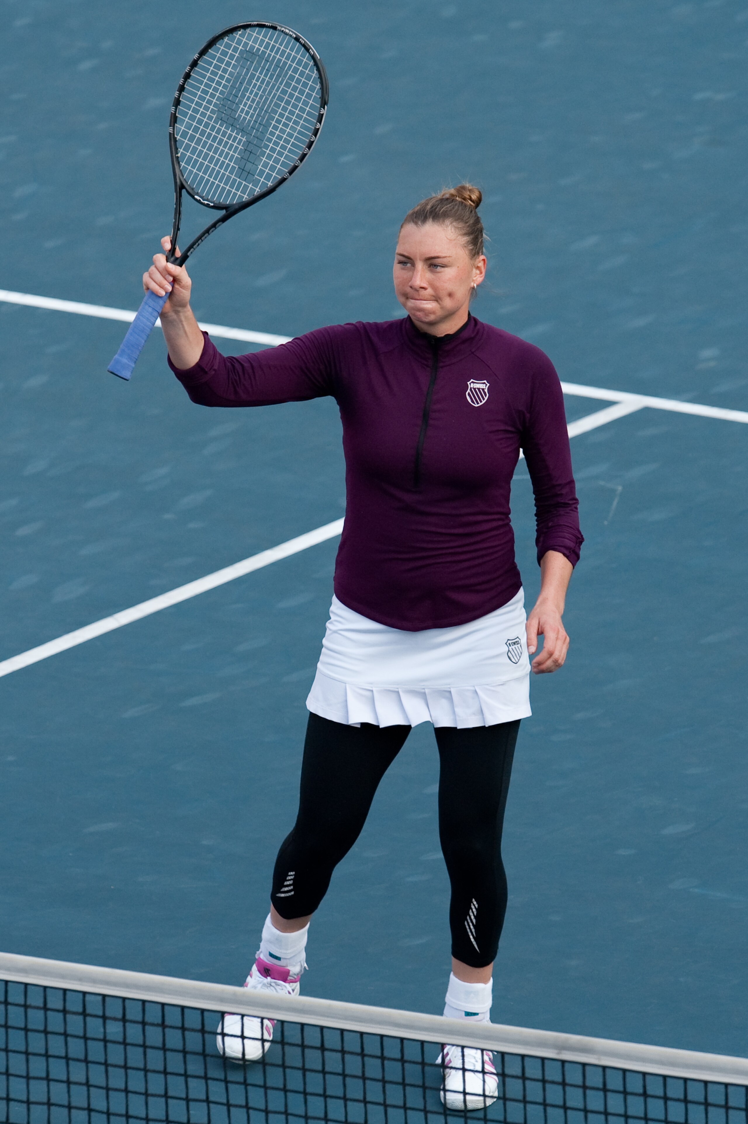 HONG KONG - JANUARY 08:  Vera Zvonareva of Russia greets the crowd after winning her match against Caroline Wozniacki of Denmark during day four of the Hong Kong Tennis Classic 2011 on January 8, 2011 in Hong Kong, China.  (Photo by Victor Fraile/Getty Im
