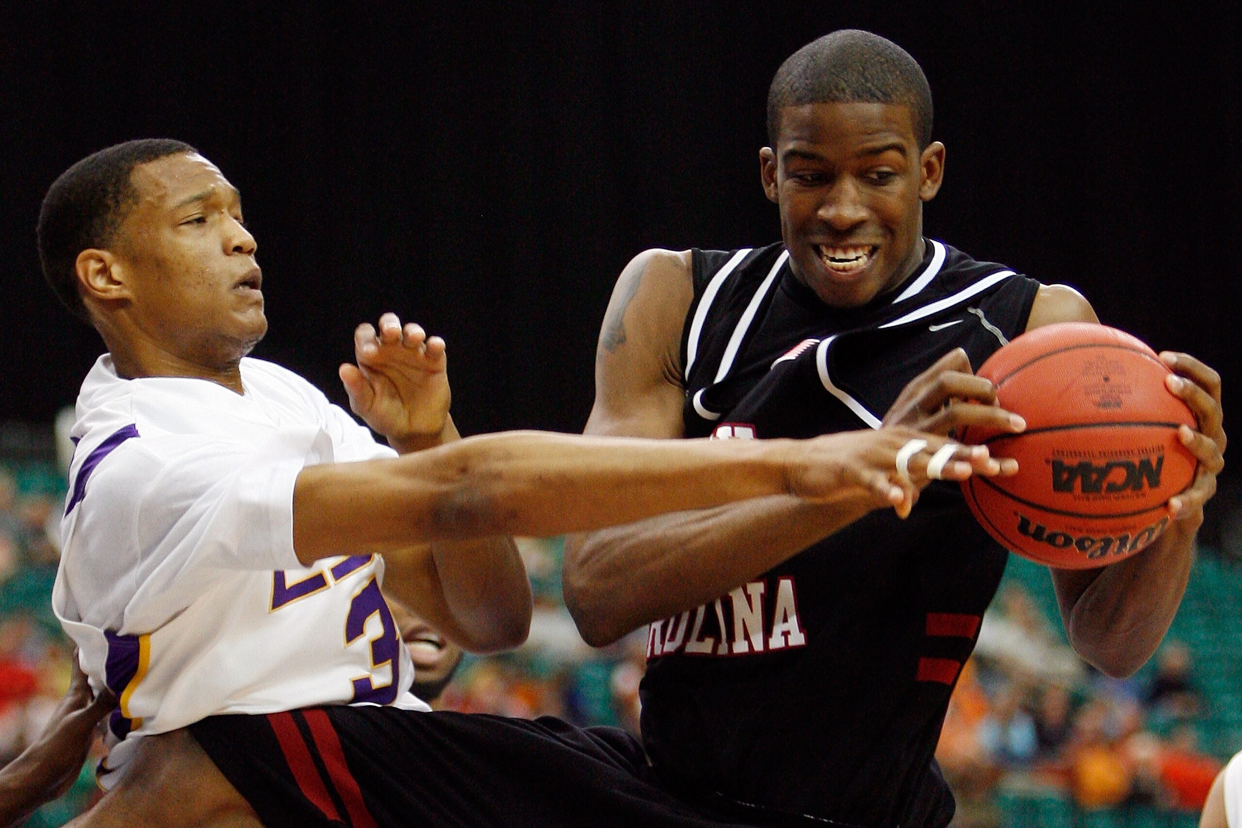 ATLANTA - MARCH 13:  Sam Muldrow III (R) of the South Carolina Gamecocks fights for a rebound with Anthony Randolph #3 of the Louisiana State University Tigers during the SEC Basketball Tournament on March 13, 2008 at the Georgia Dome in Atlanta, Georgia.