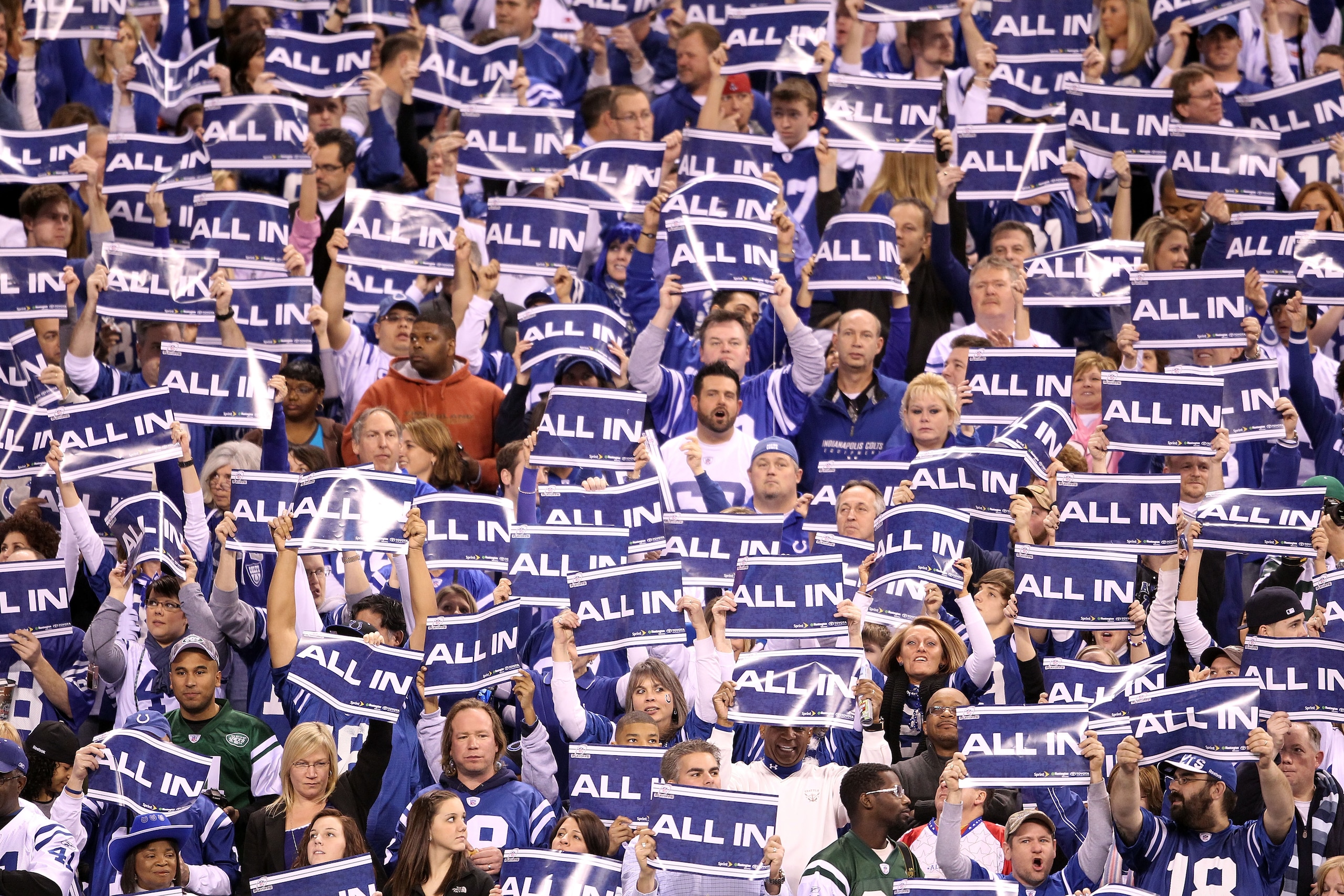 INDIANAPOLIS, IN - JANUARY 08:  Fans of the Indianapolis Colts hold up signs which read 'All In' in support of their team against the New York Jets during their 2011 AFC wild card playoff game at Lucas Oil Stadium on January 8, 2011 in Indianapolis, India