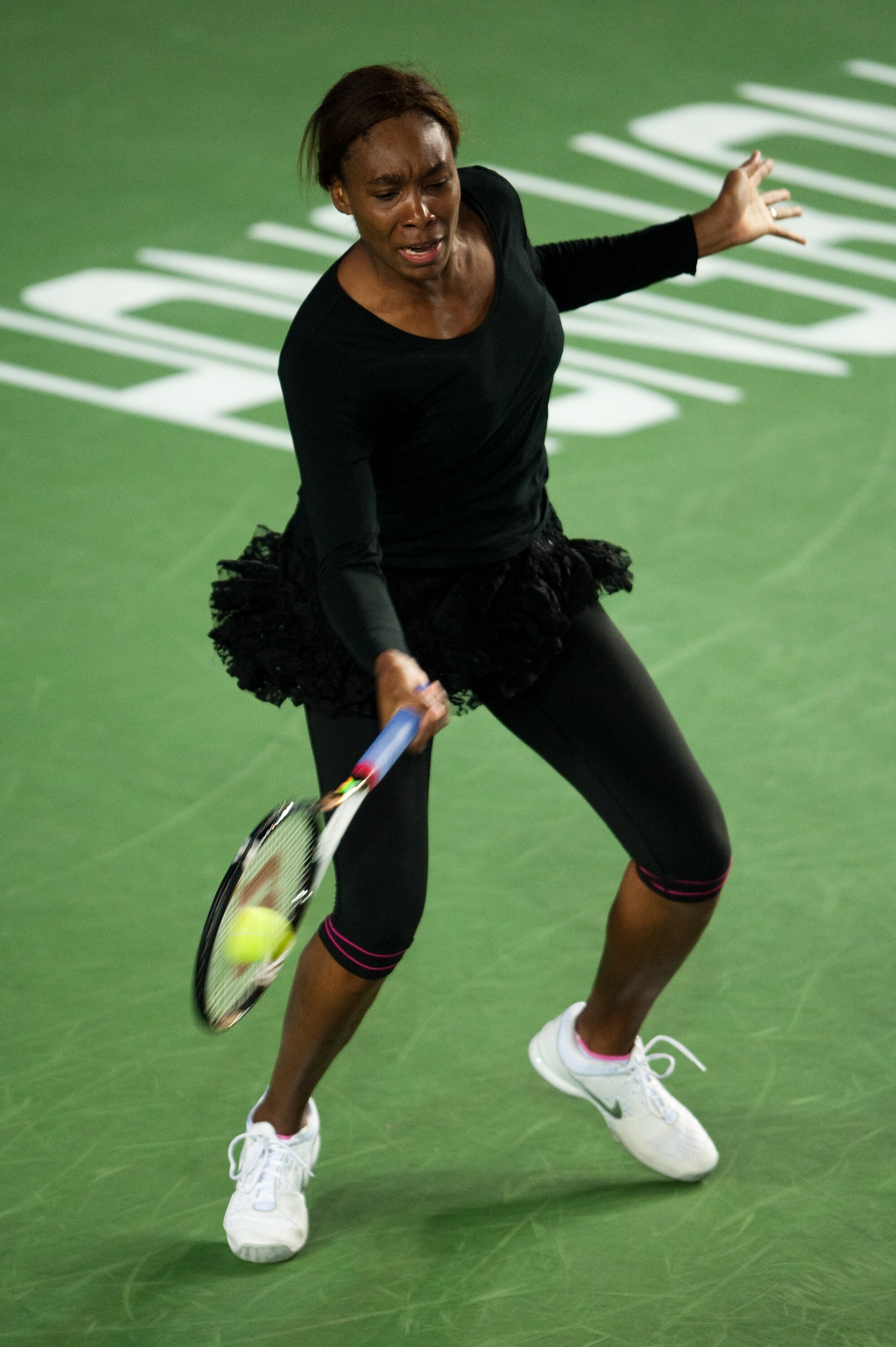 HONG KONG, CHINA - JANUARY 06:  Venus Williams of the USA in action during her match against Vera Zvonareva of Russia on day two of the Hong Kong Tennis Classic at the Victoria stadium on January 6, 2011 in Hong Kong, China.  (Photo by Victor Fraile/Getty