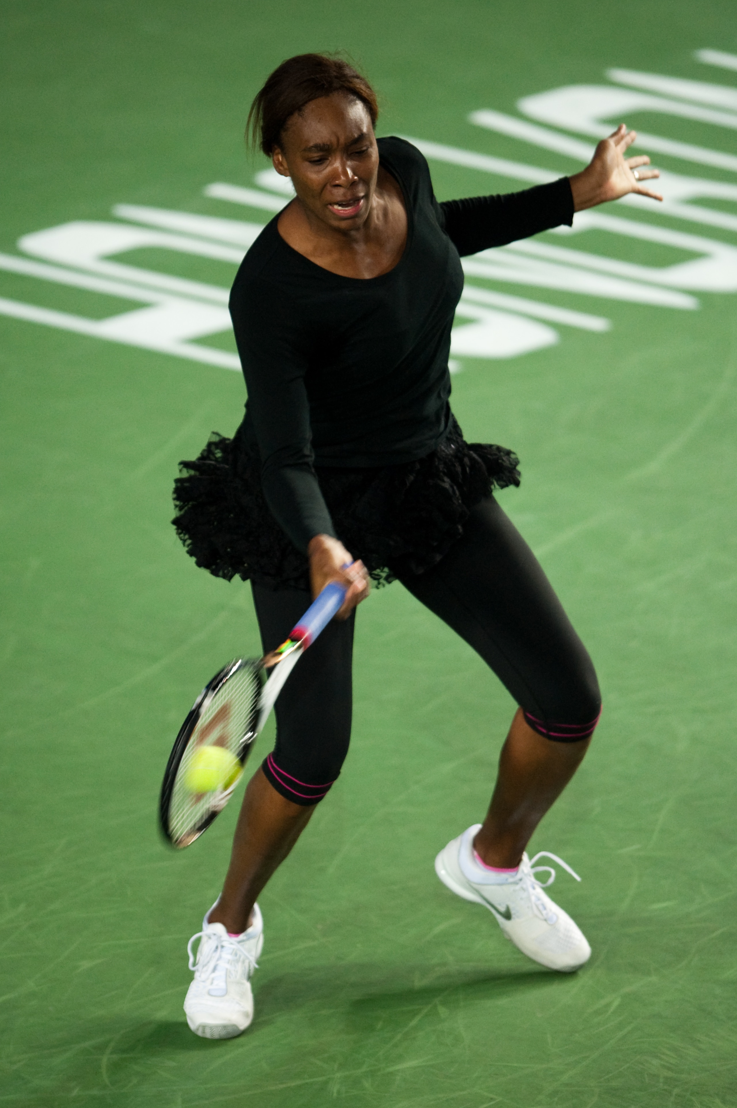 HONG KONG, CHINA - JANUARY 06:  Venus Williams of the USA in action during her match against Vera Zvonareva of Russia on day two of the Hong Kong Tennis Classic at the Victoria stadium on January 6, 2011 in Hong Kong, China.  (Photo by Victor Fraile/Getty